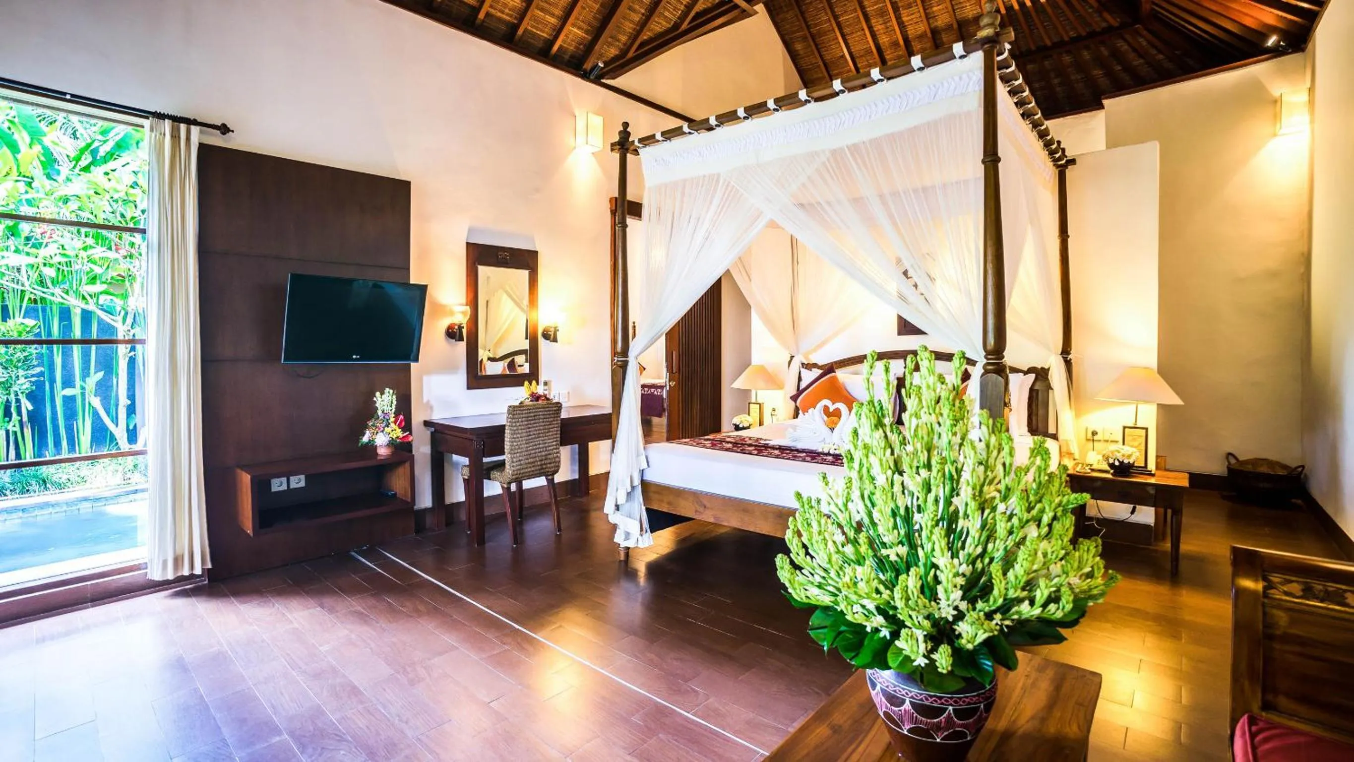 Photo of the whole room, Bed in Kori Ubud Resort, Restaurant & Spa