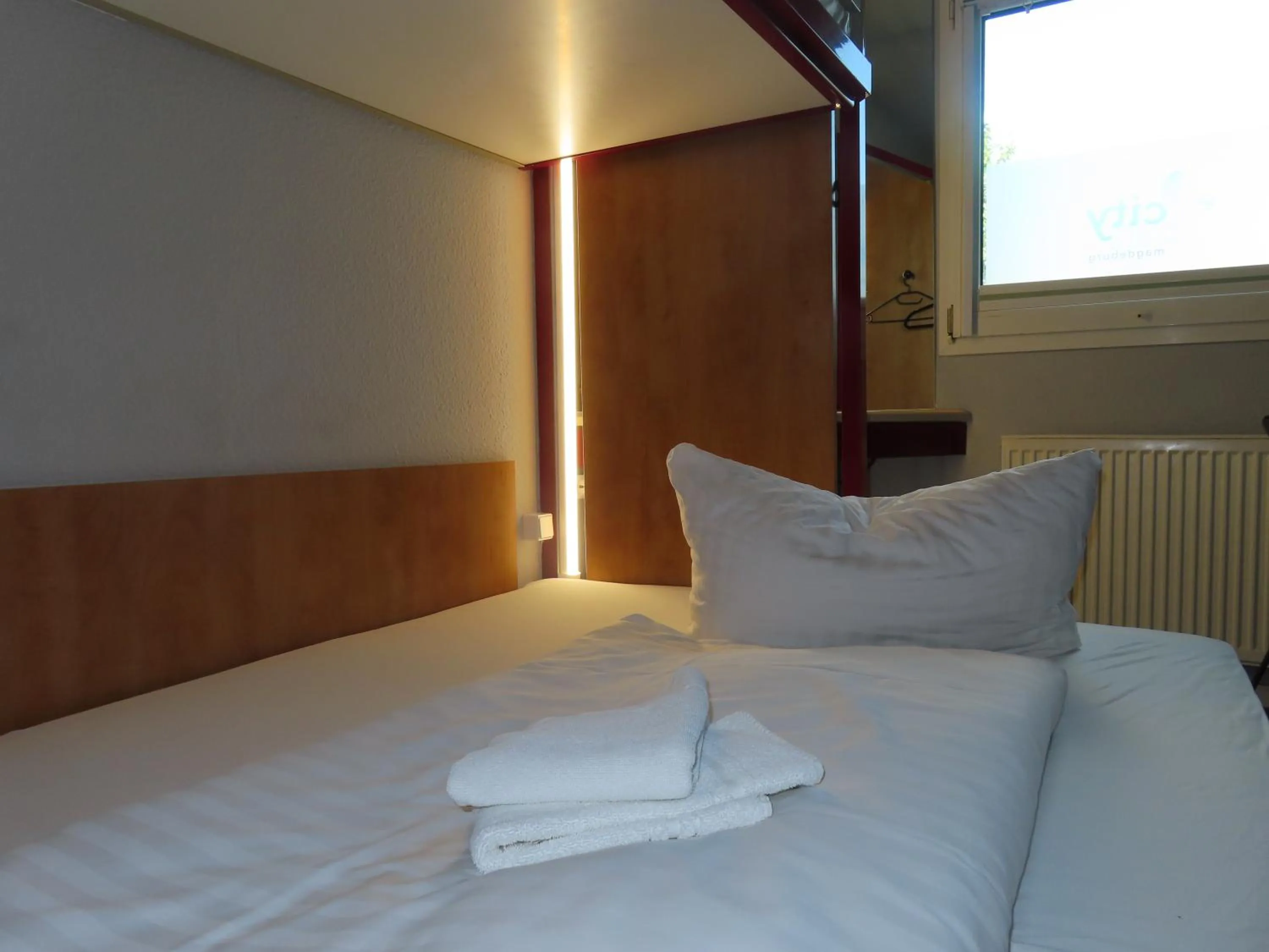 Bed in Hotel City Inn