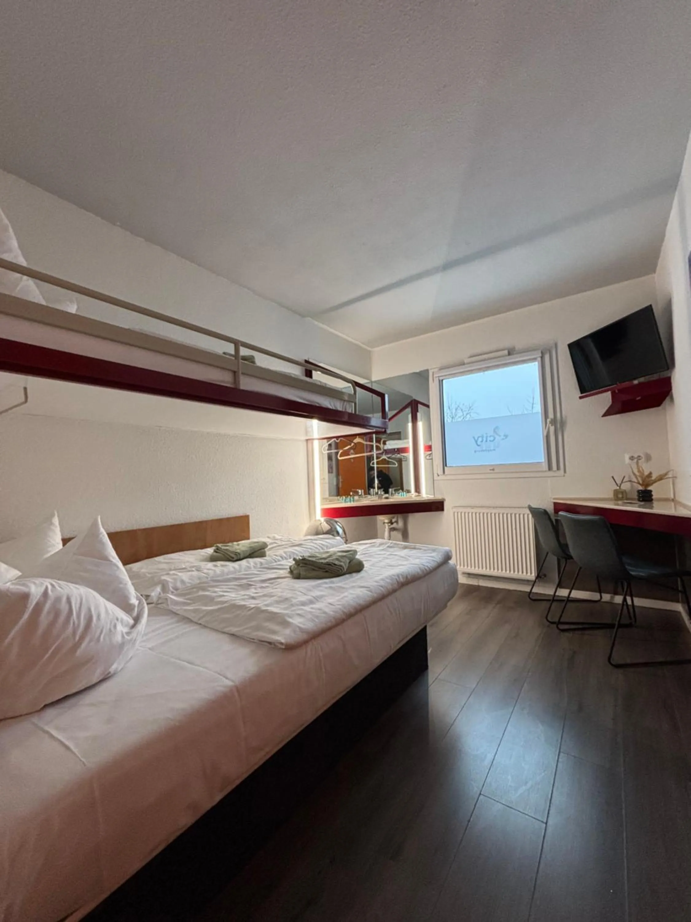 Bed in Hotel City Inn