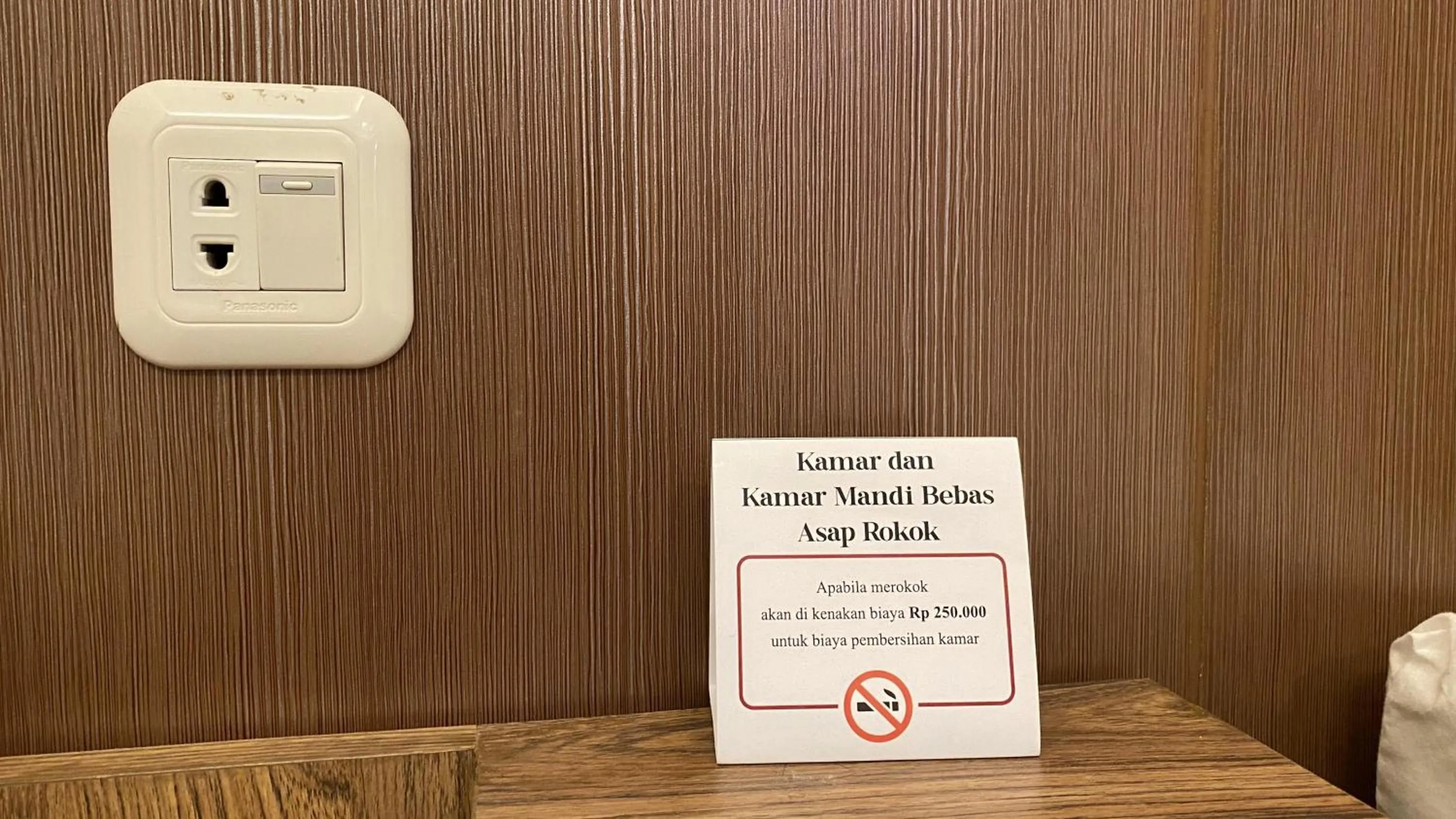 Text overlay in Mawar Asri Hotel