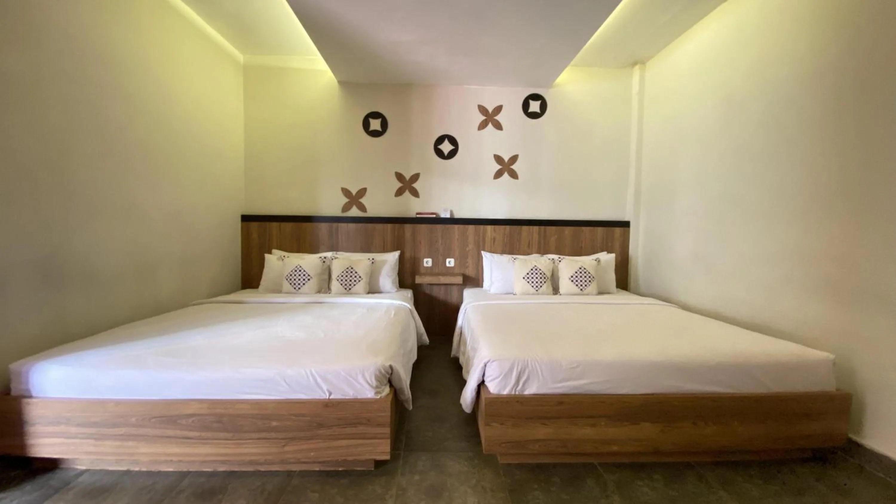 Bed in Mawar Asri Hotel