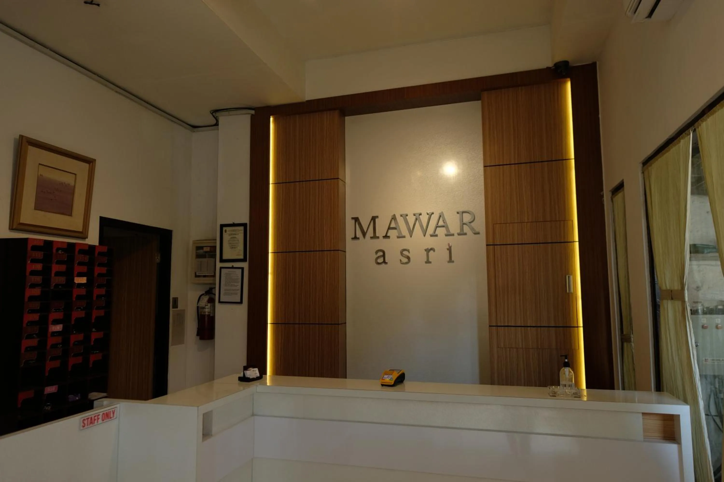 Lobby or reception in Mawar Asri Hotel
