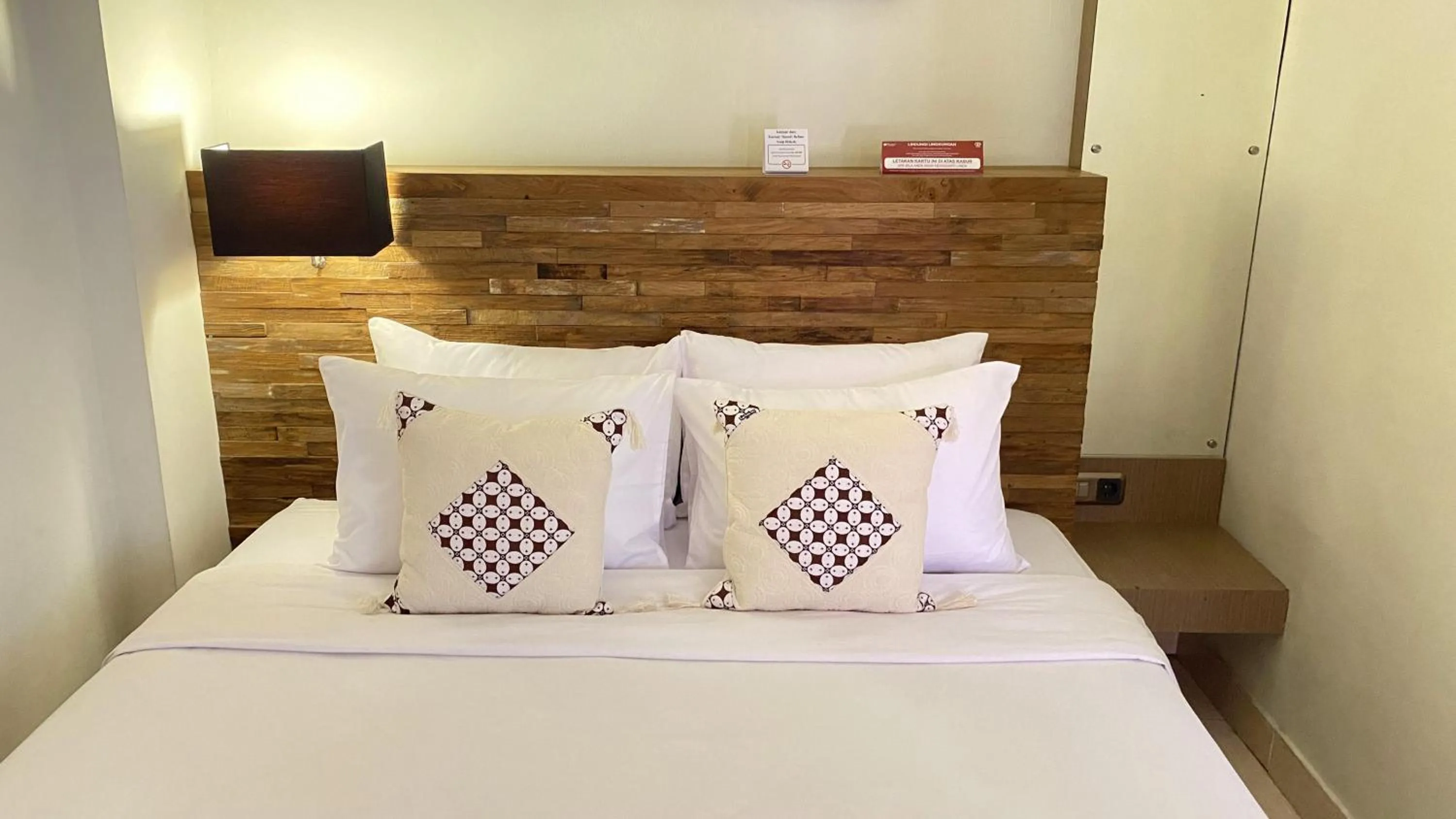 Bed in Mawar Asri Hotel