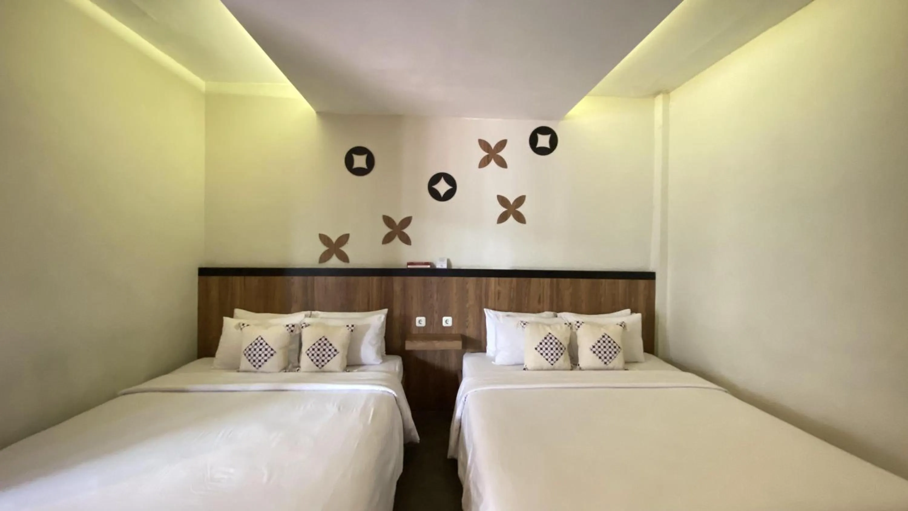 Bed in Mawar Asri Hotel