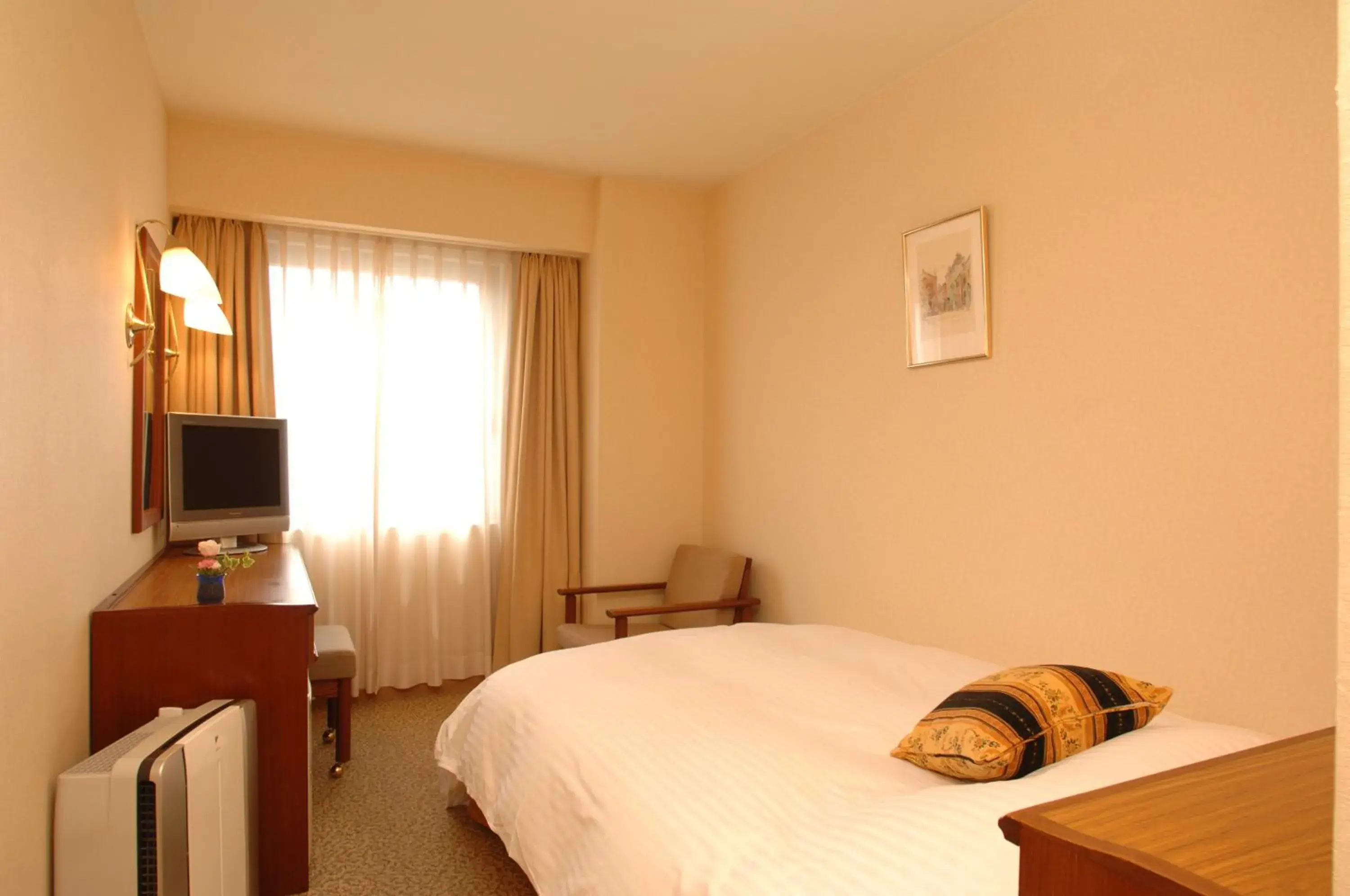 Bed in Grand Plaza Nakatsu Hotel Bed in Grand Plaza Nakatsu Hotel