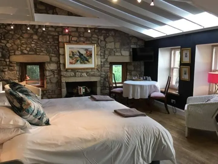 Photo of the whole room, Bed in The Studio at Maspie House