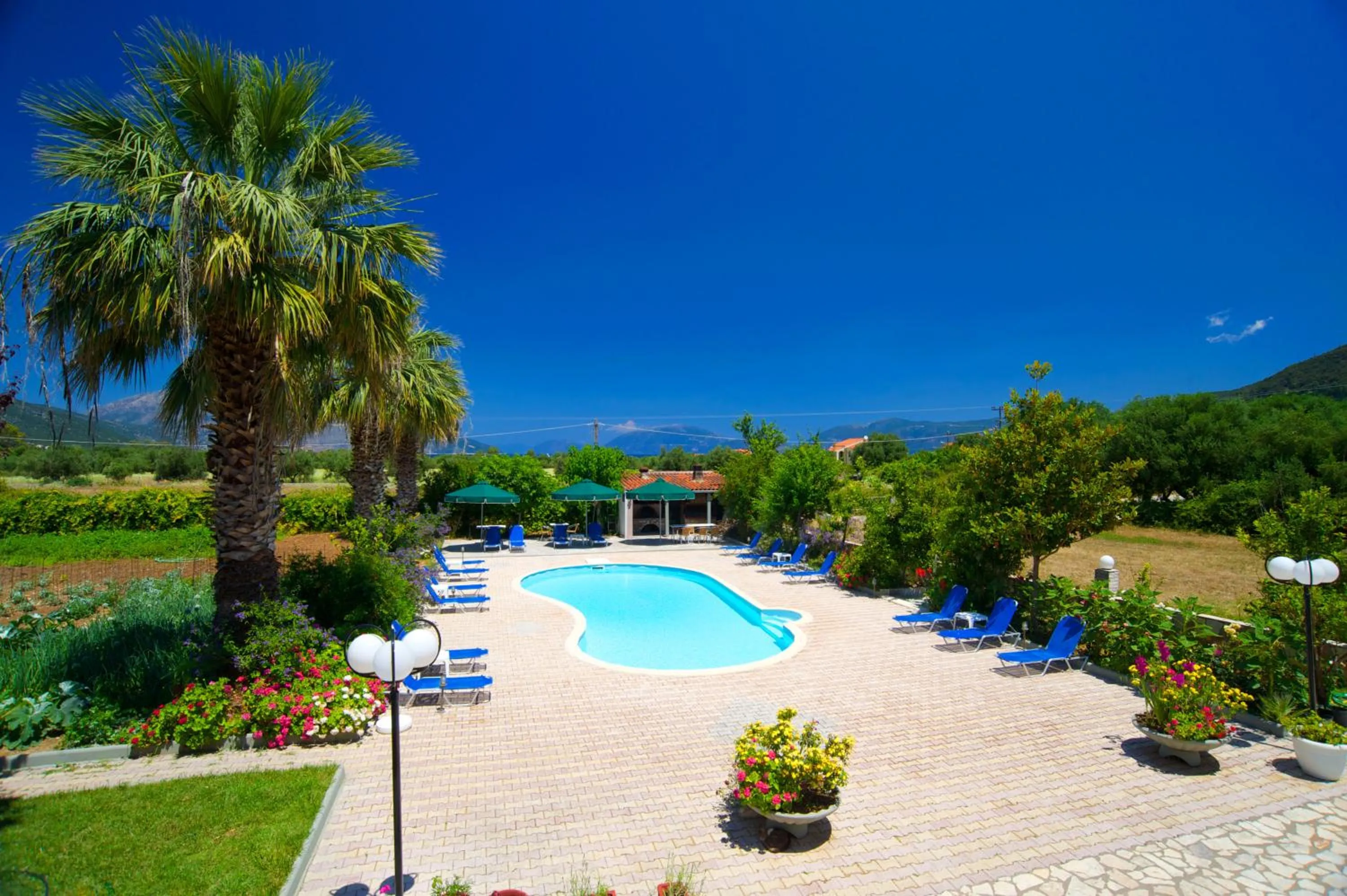 Swimming pool in Nikos Studios and Apartments