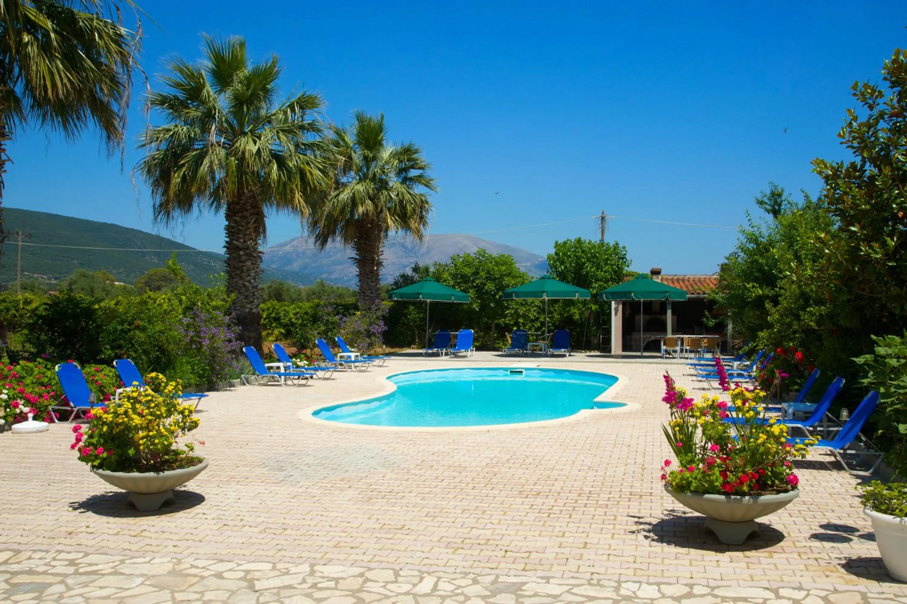 Swimming pool in Nikos Studios and Apartments