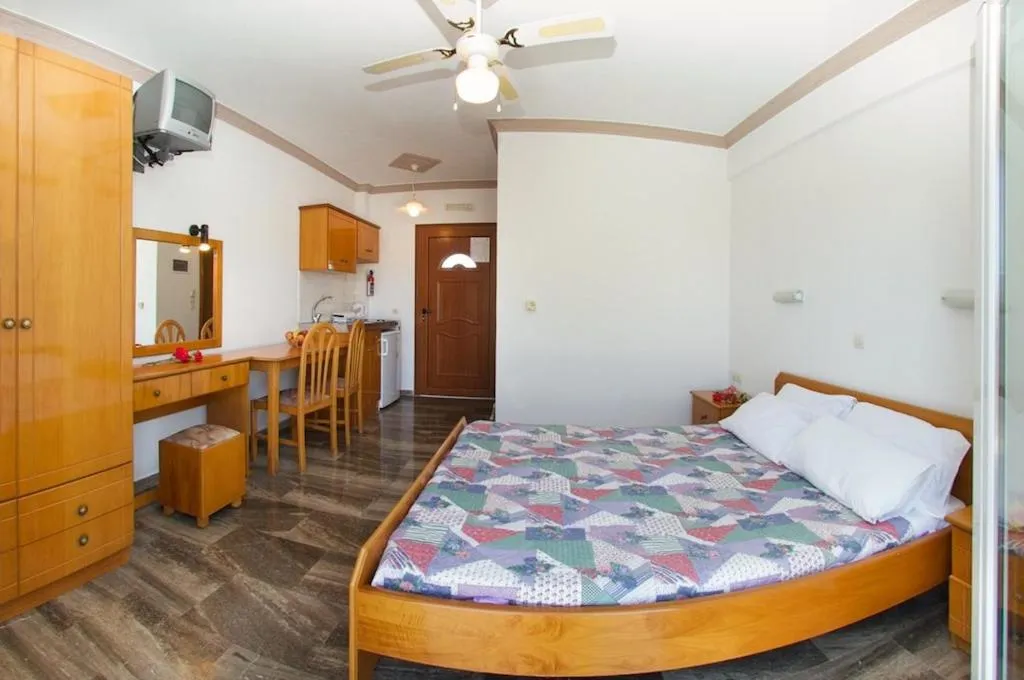 Summer, Bed in Nikos Studios and Apartments