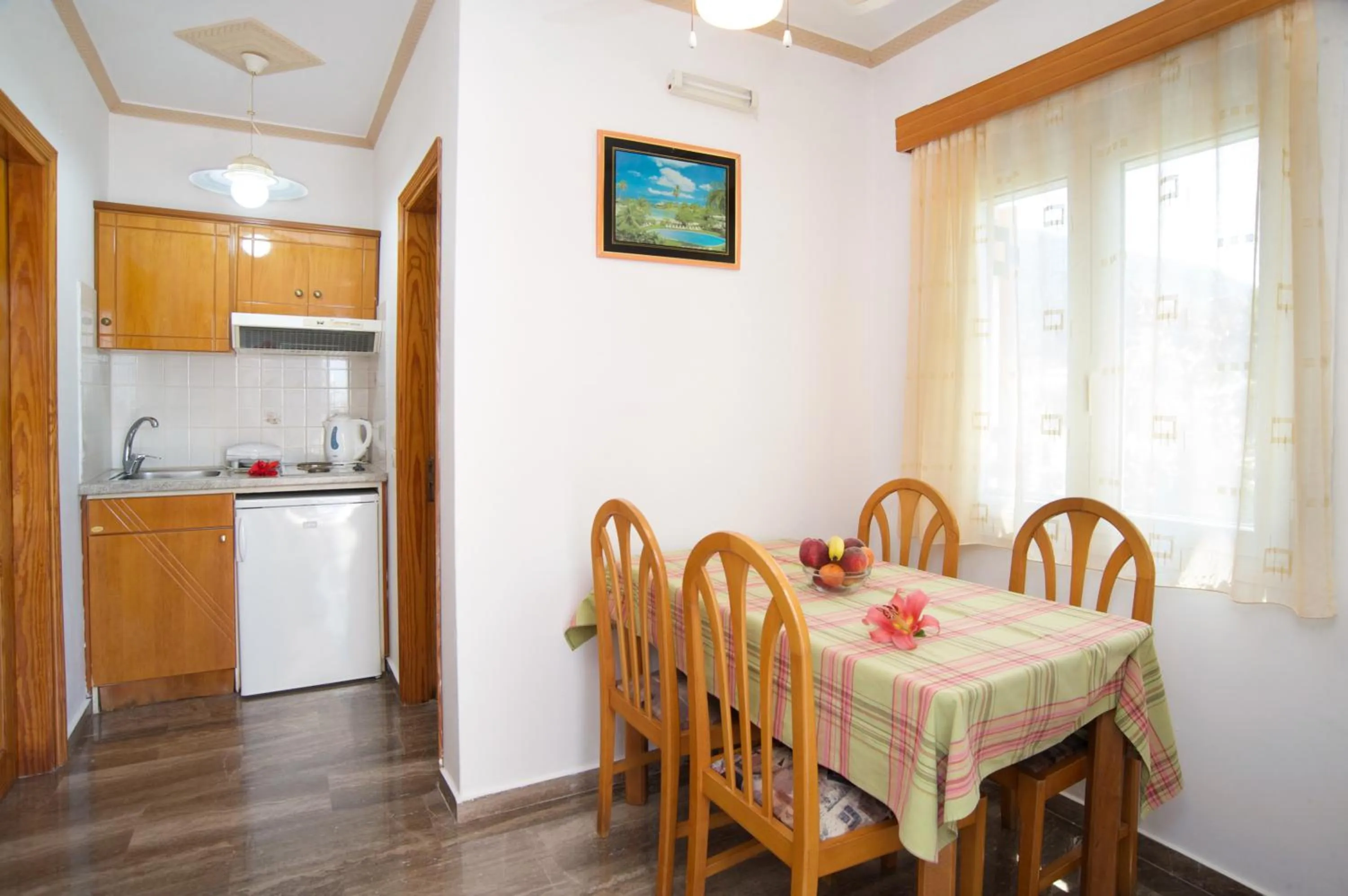 Dining area in Nikos Studios and Apartments
