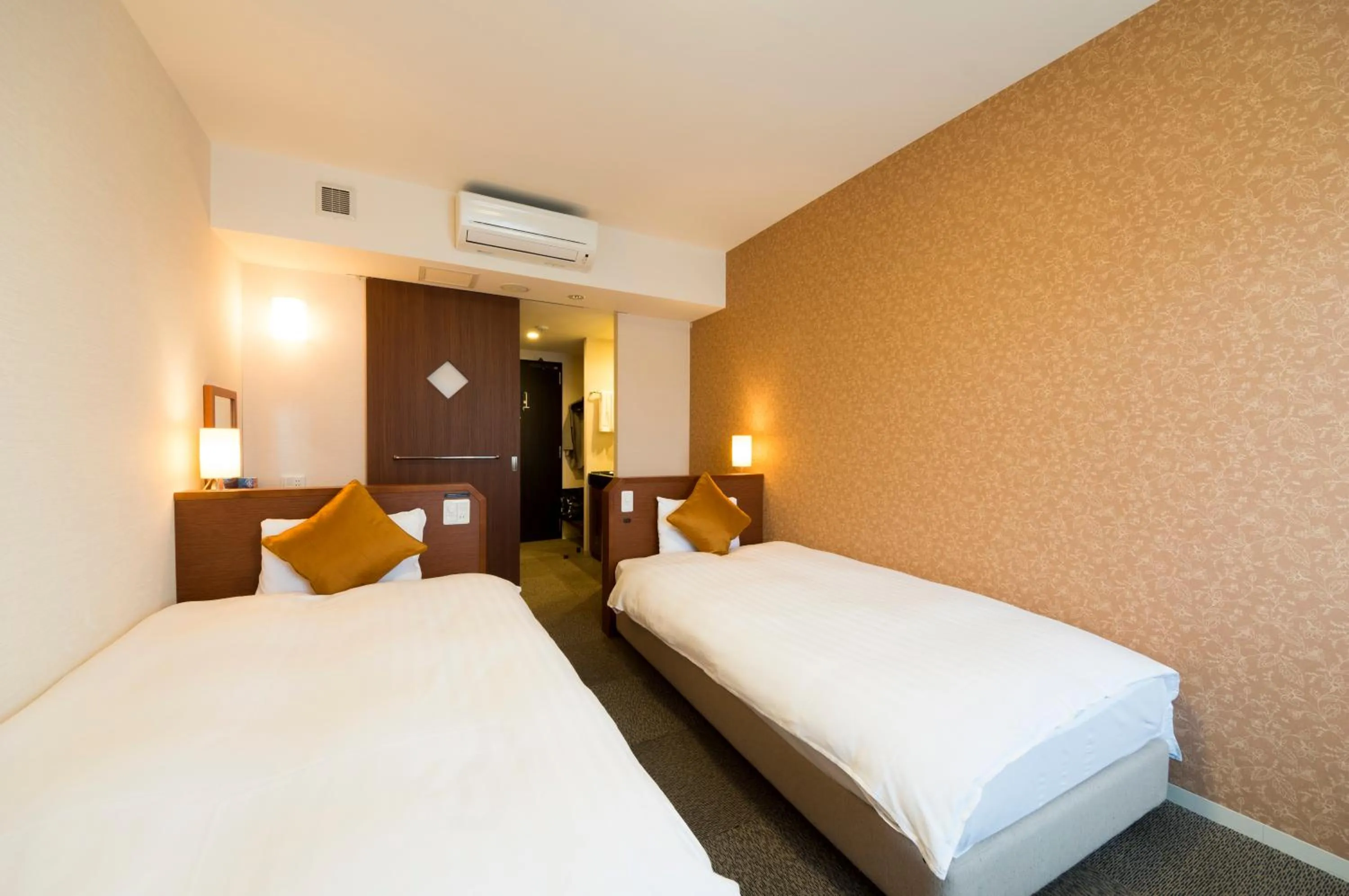 Bed in Dormy Inn Premium Wakayama Natural Hot Spring