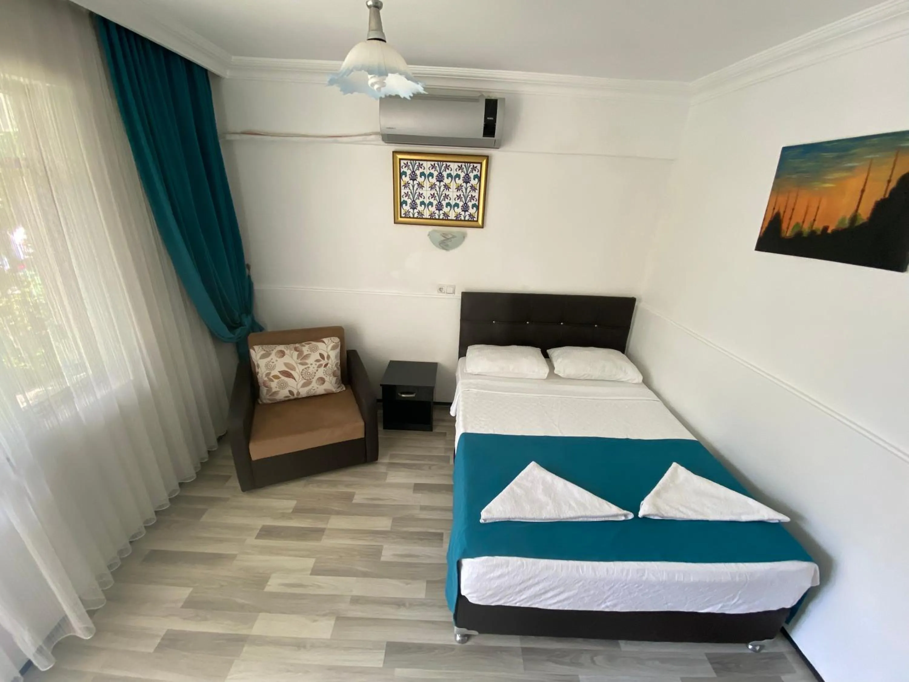 Bed in Sunrise Aya Hotel