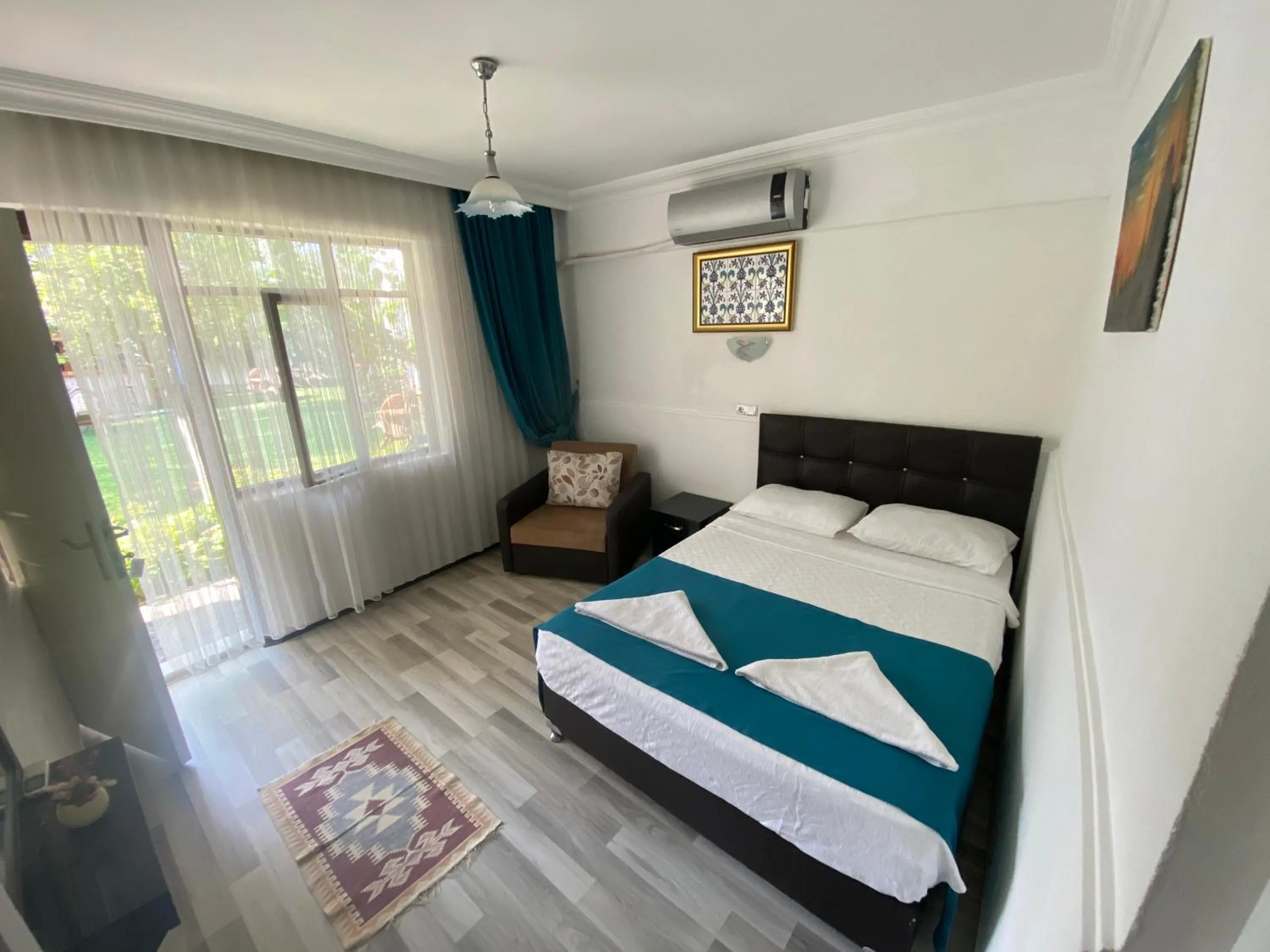 Bed in Sunrise Aya Hotel