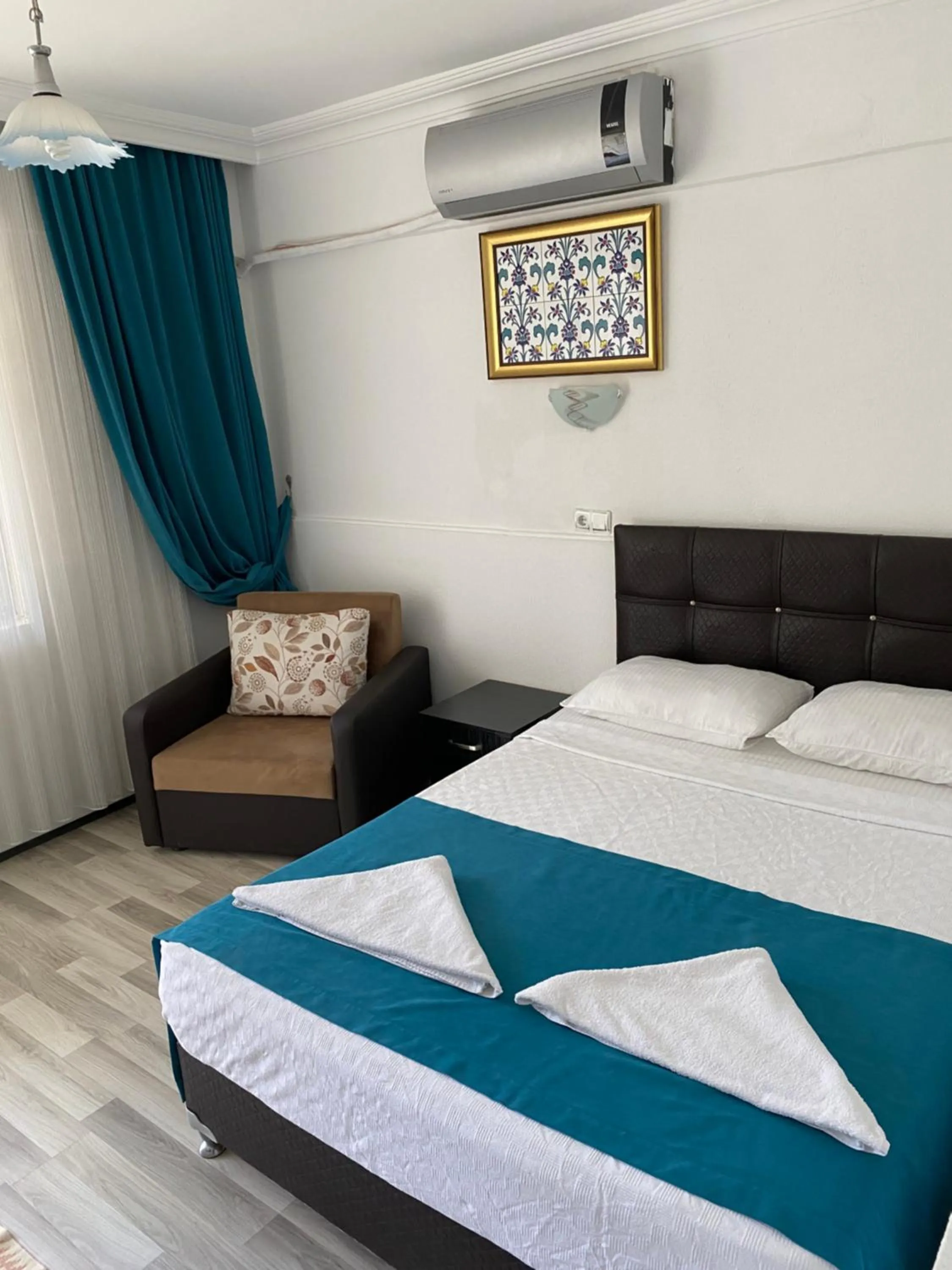 Bed in Sunrise Aya Hotel