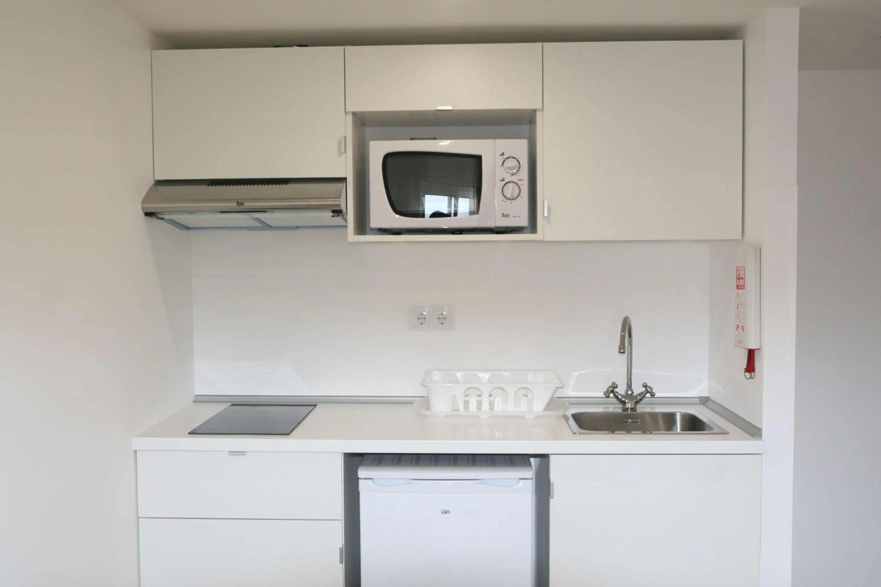 Kitchen or kitchenette in Florasol Residence Hotel - Dorisol hotels