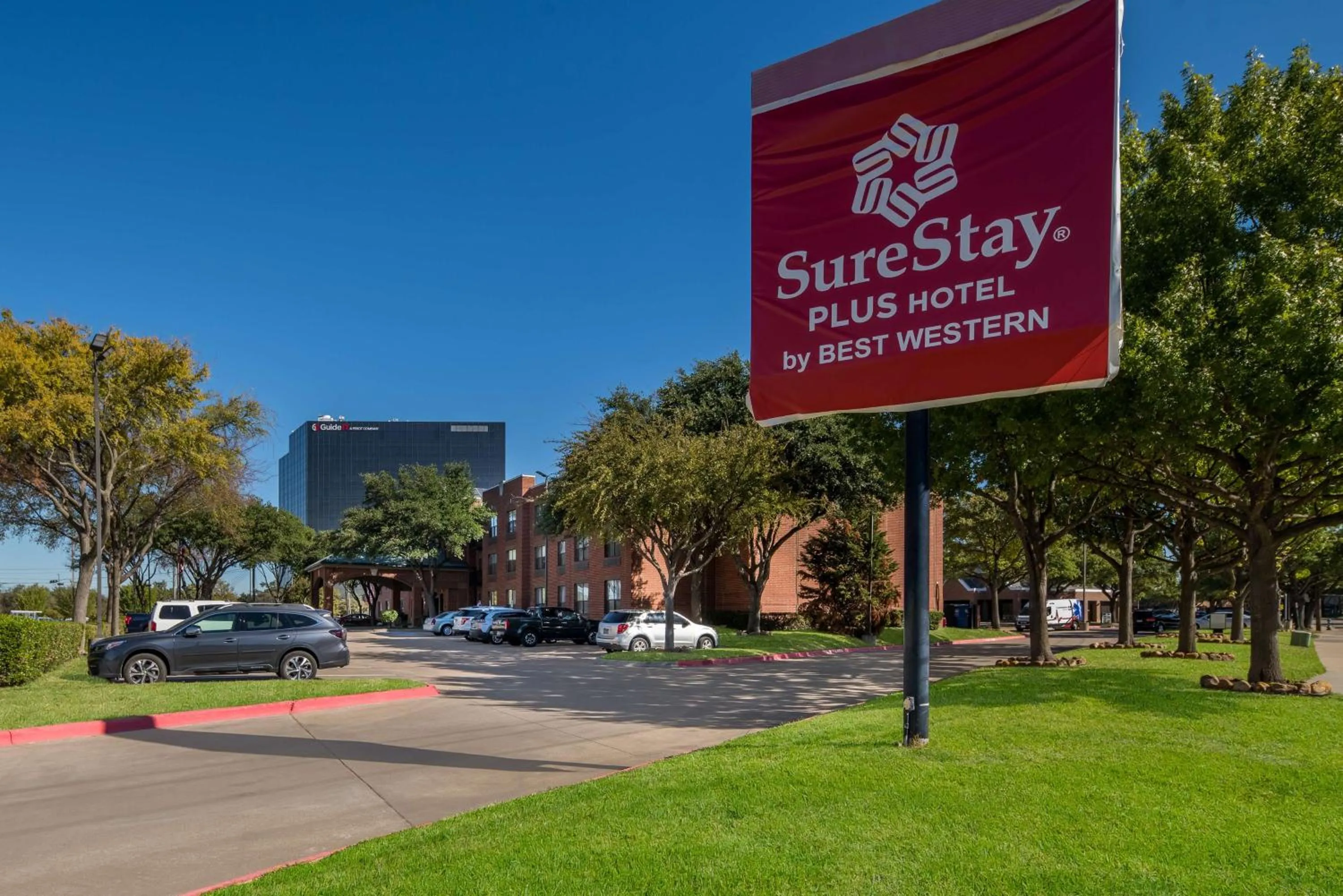 Property building in SureStay Plus Hotel by Best Western Plano