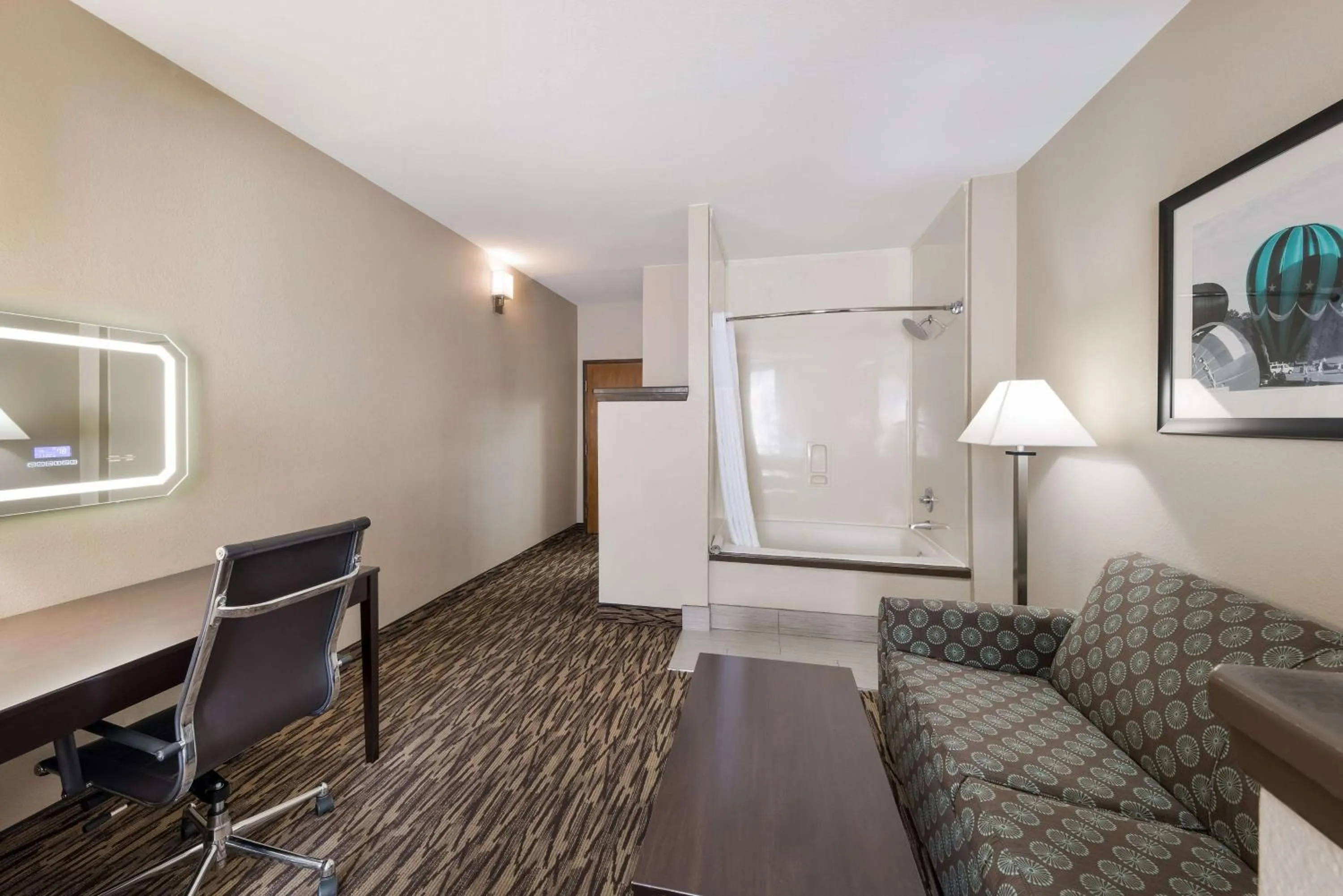 Bedroom in SureStay Plus Hotel by Best Western Plano