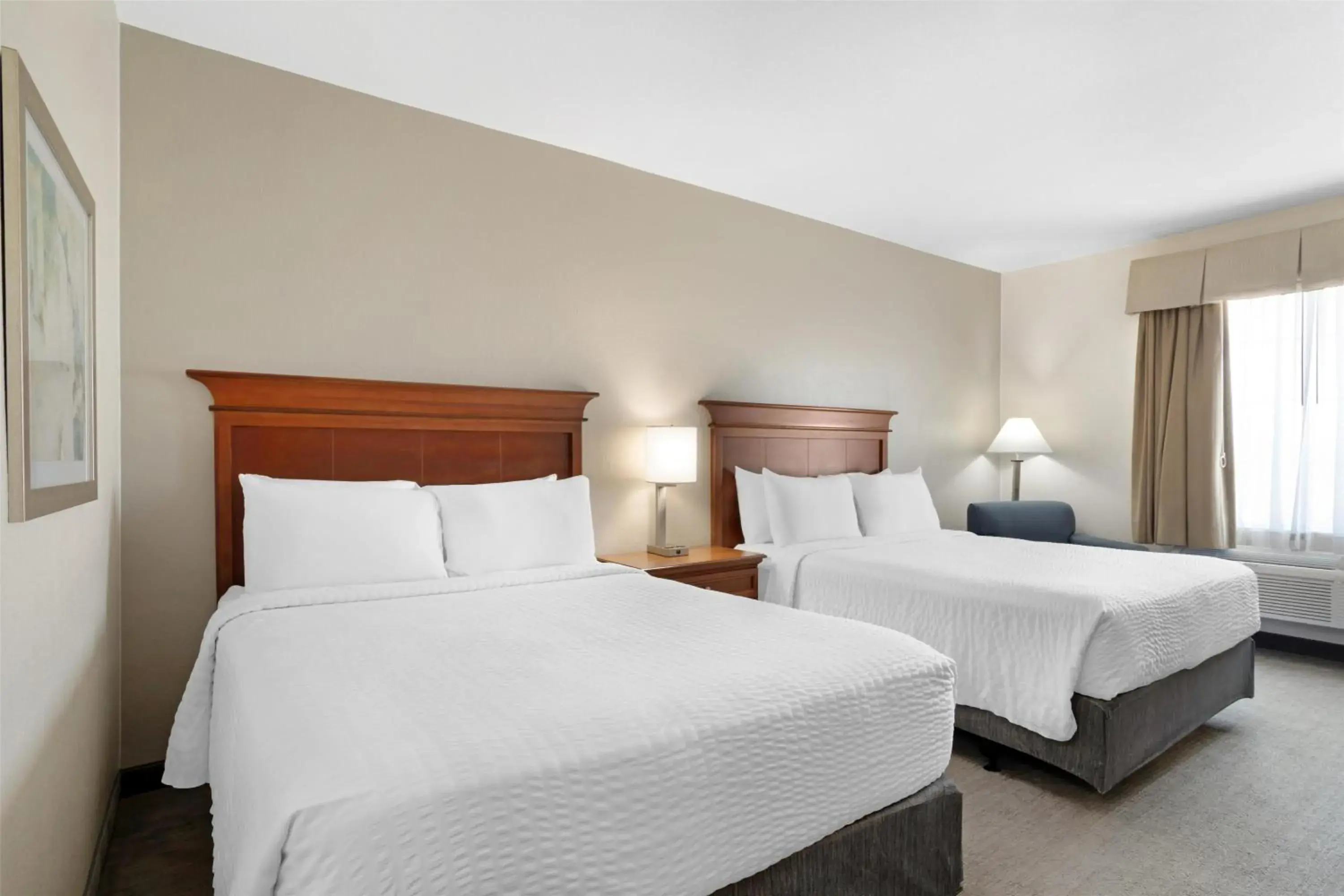 Bedroom, Bed in Best Western Plus Executive Hotel & Suites Bedroom, Bed in Best Western Plus Executive Hotel & Suites