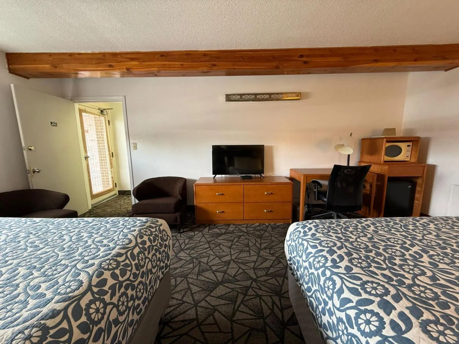 Bedroom, Bed in Tomahawk Motor Lodge By OYO Riverton US-26