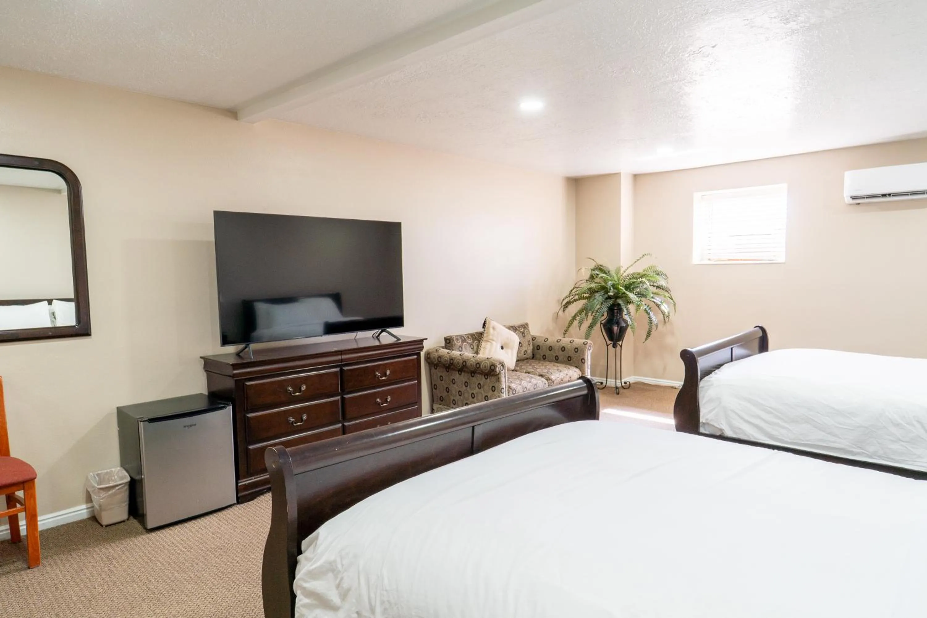 Bed in Road Creek Inn