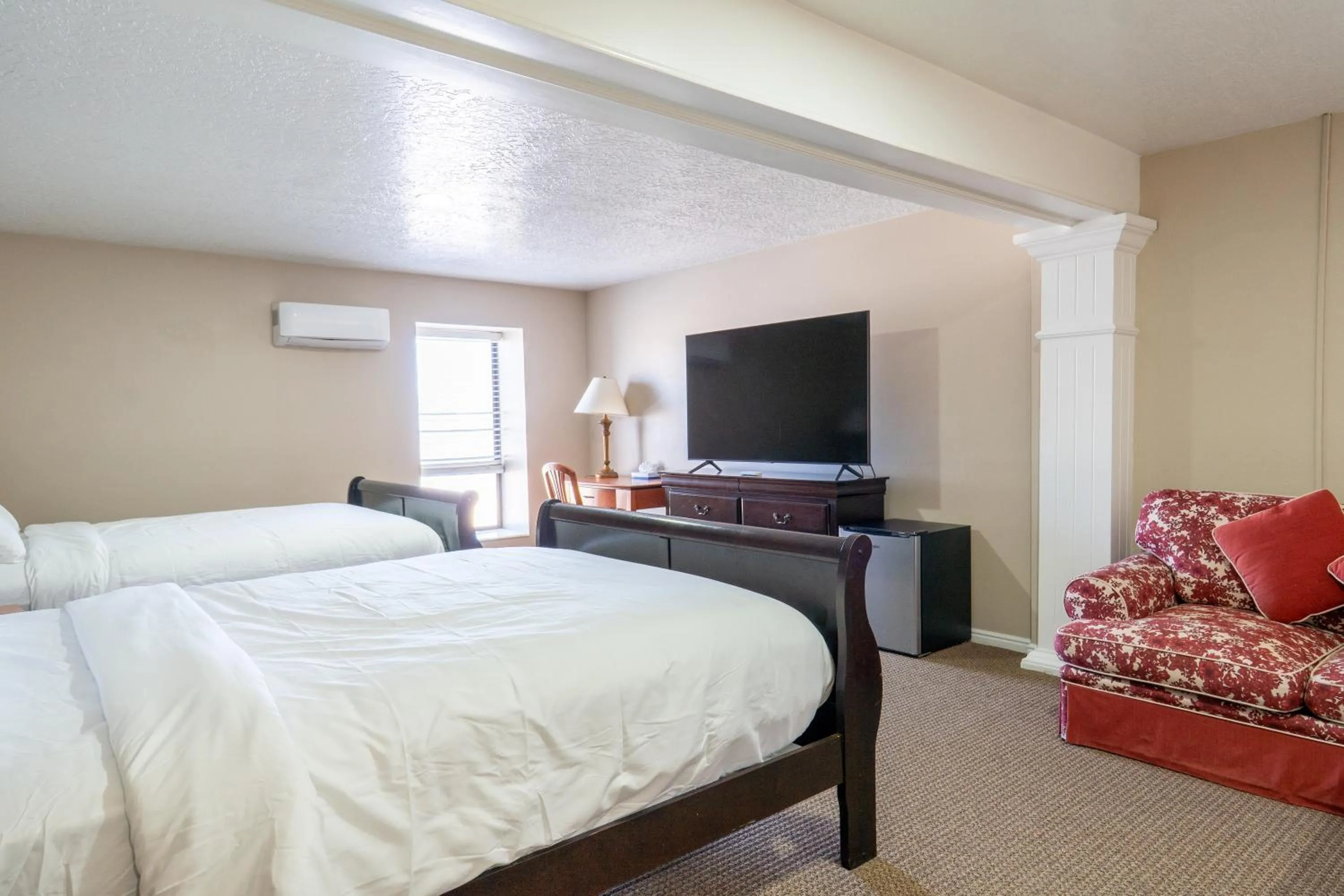 Bed in Road Creek Inn