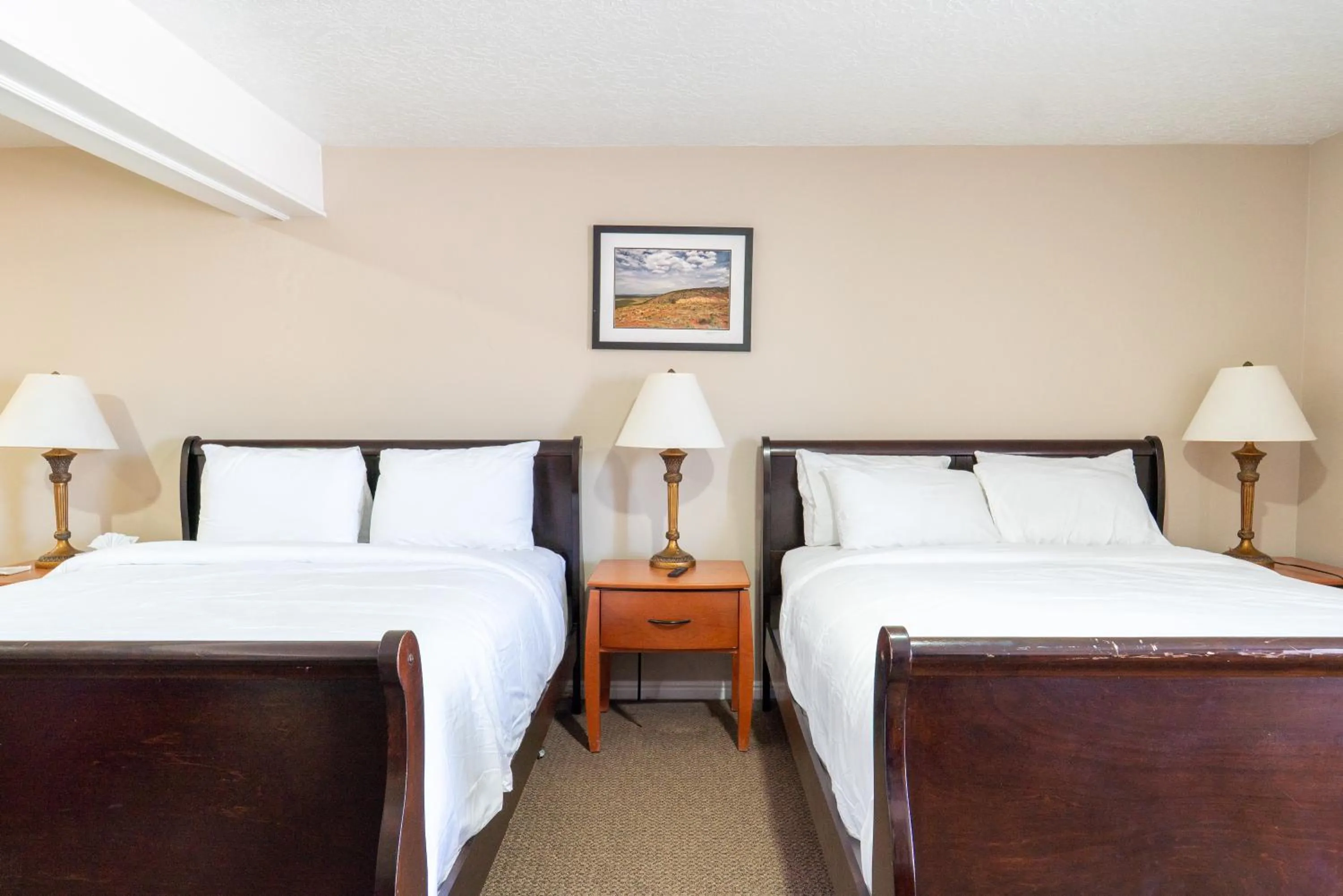 Bed in Road Creek Inn