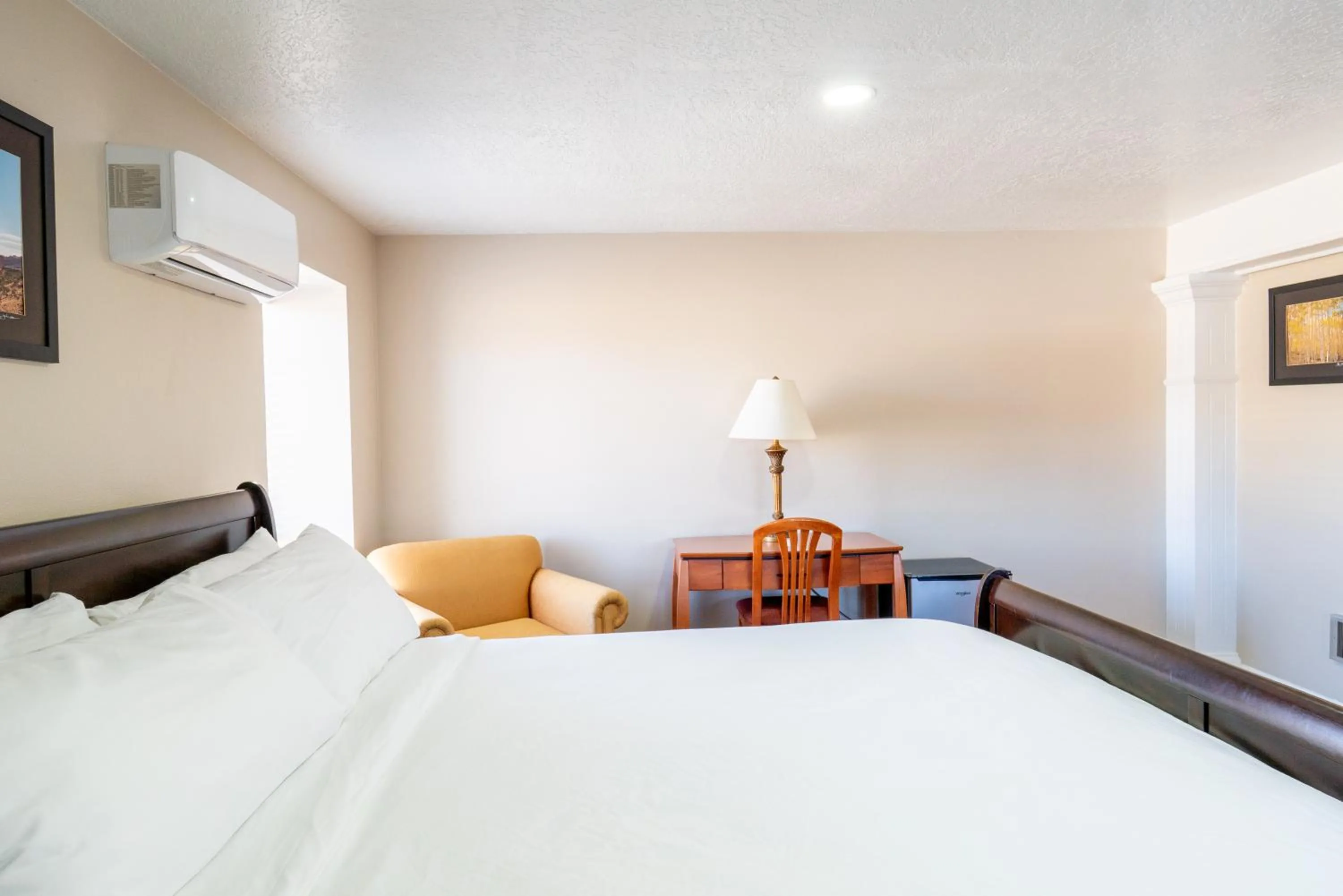 Bed in Road Creek Inn