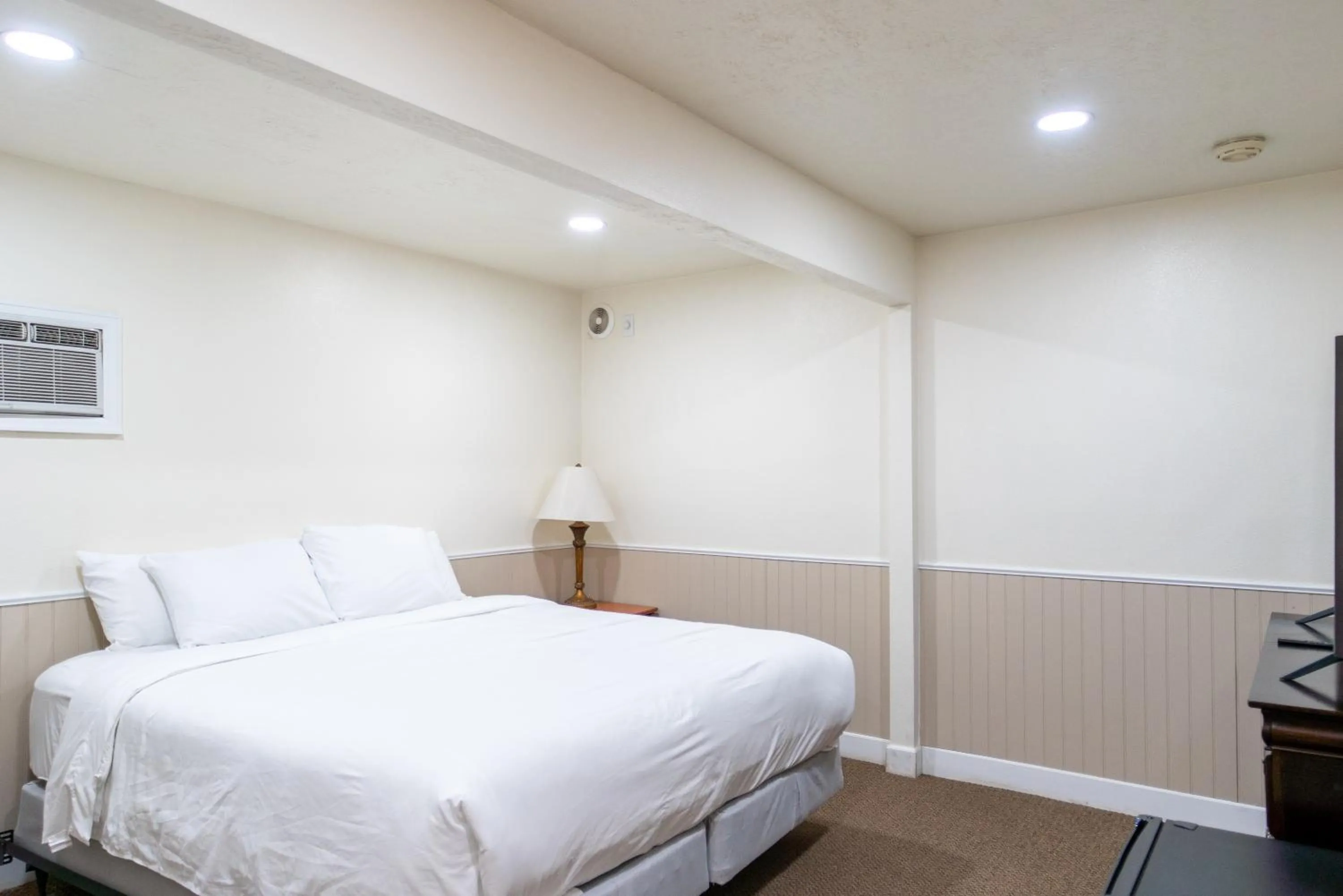 Bed in Road Creek Inn