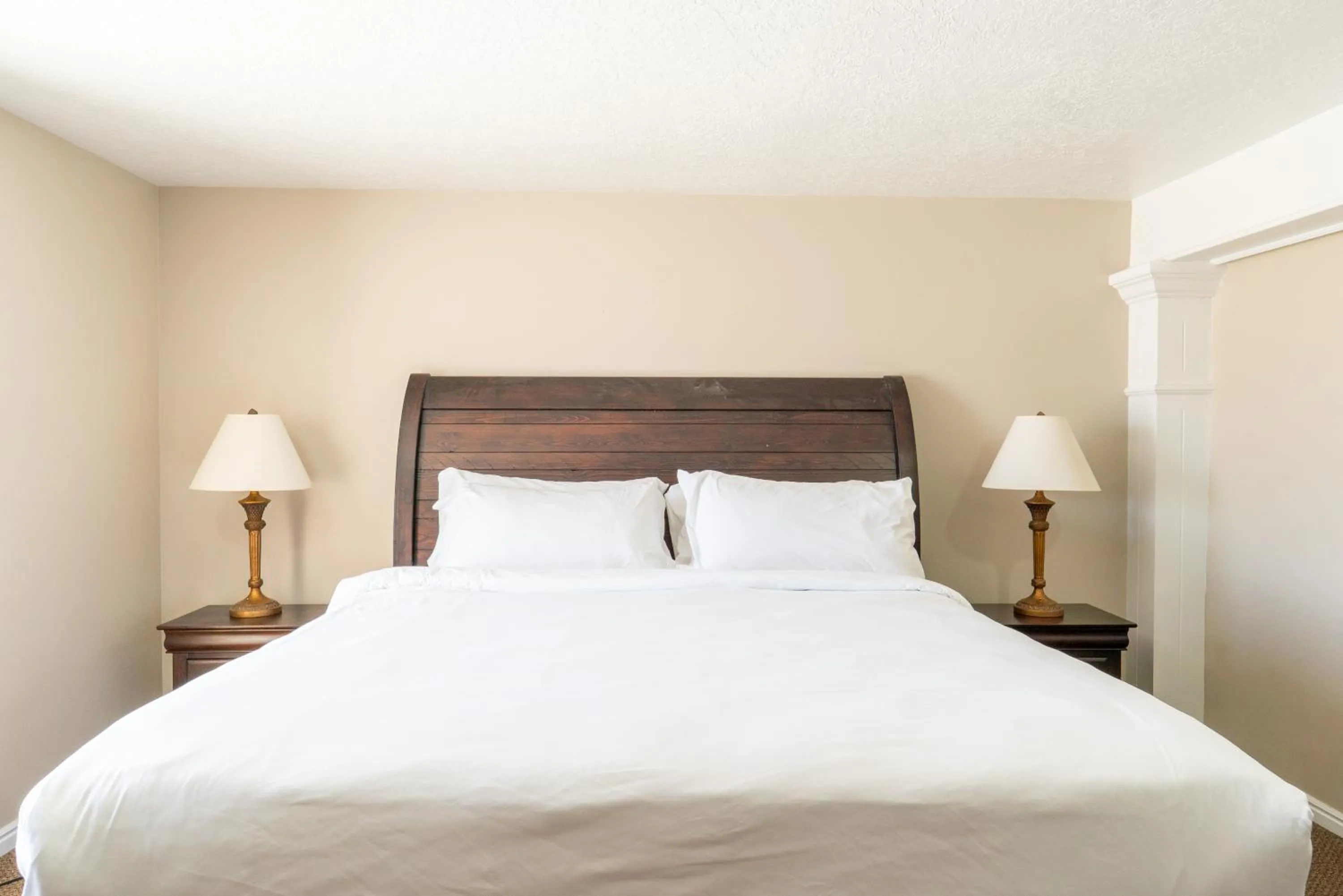Bed in Road Creek Inn