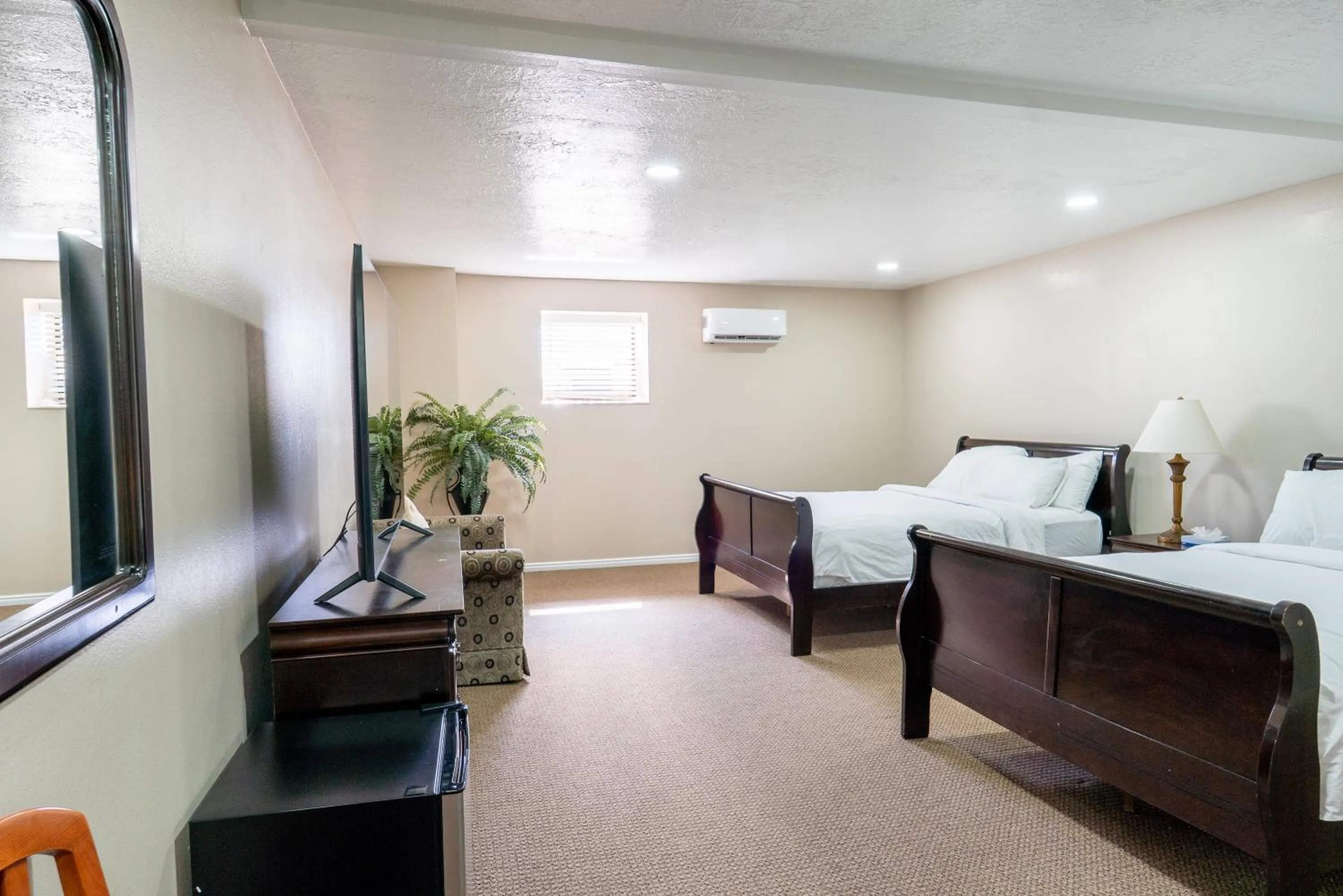 Bed in Road Creek Inn