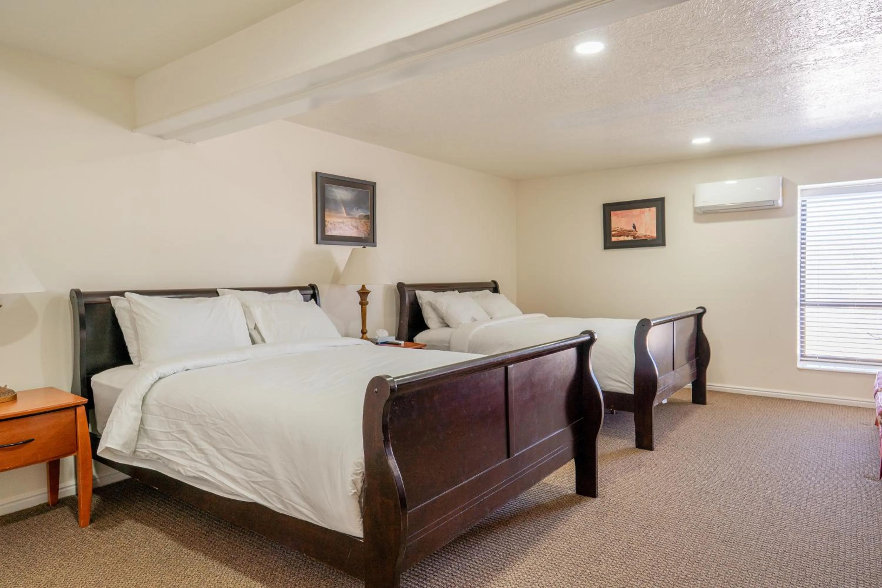 Bed in Road Creek Inn
