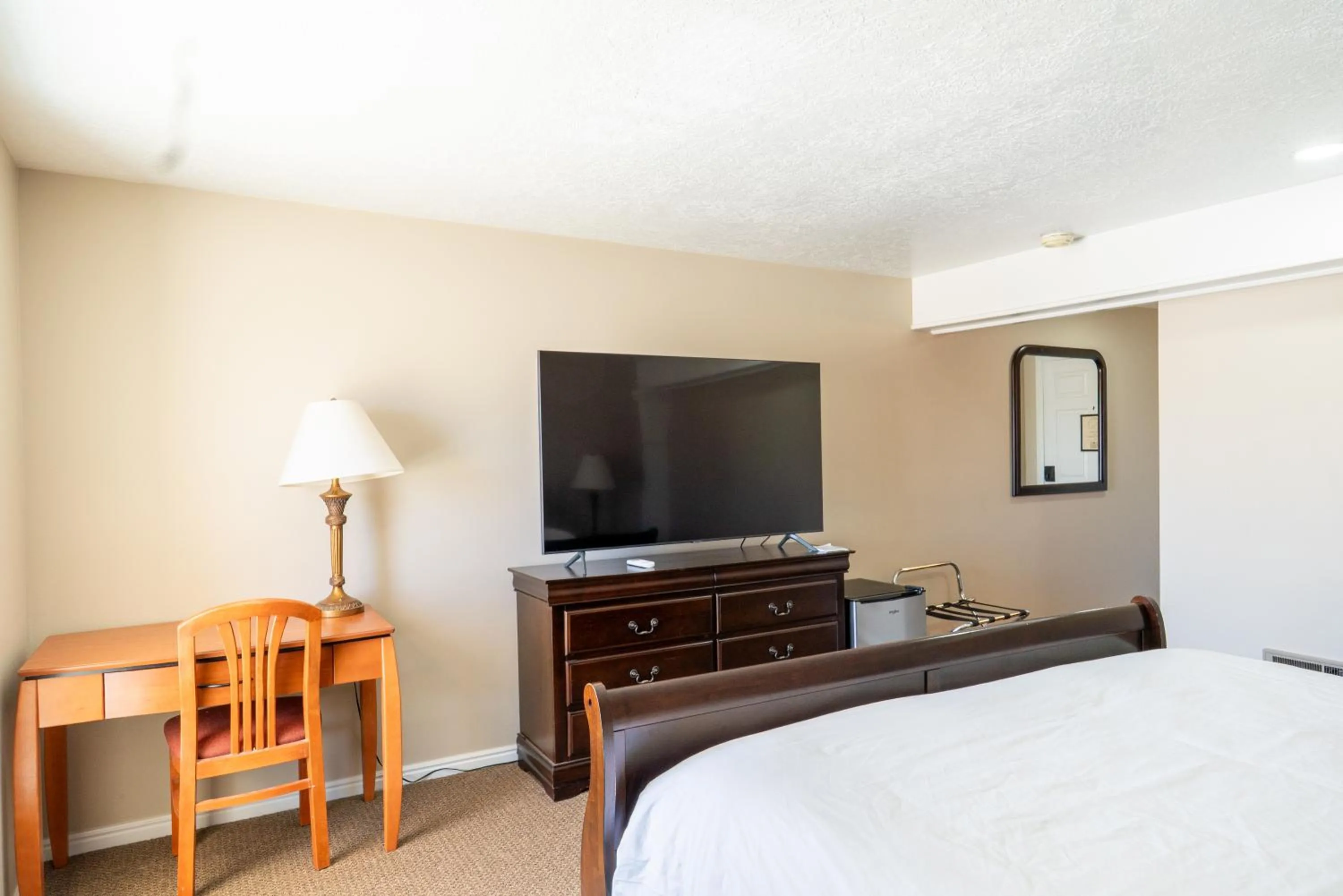 Bed in Road Creek Inn