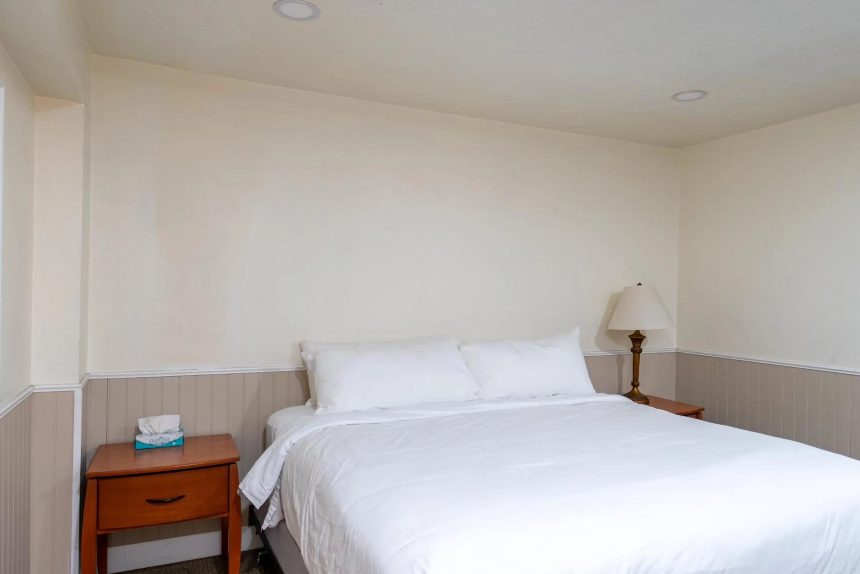 Bed in Road Creek Inn