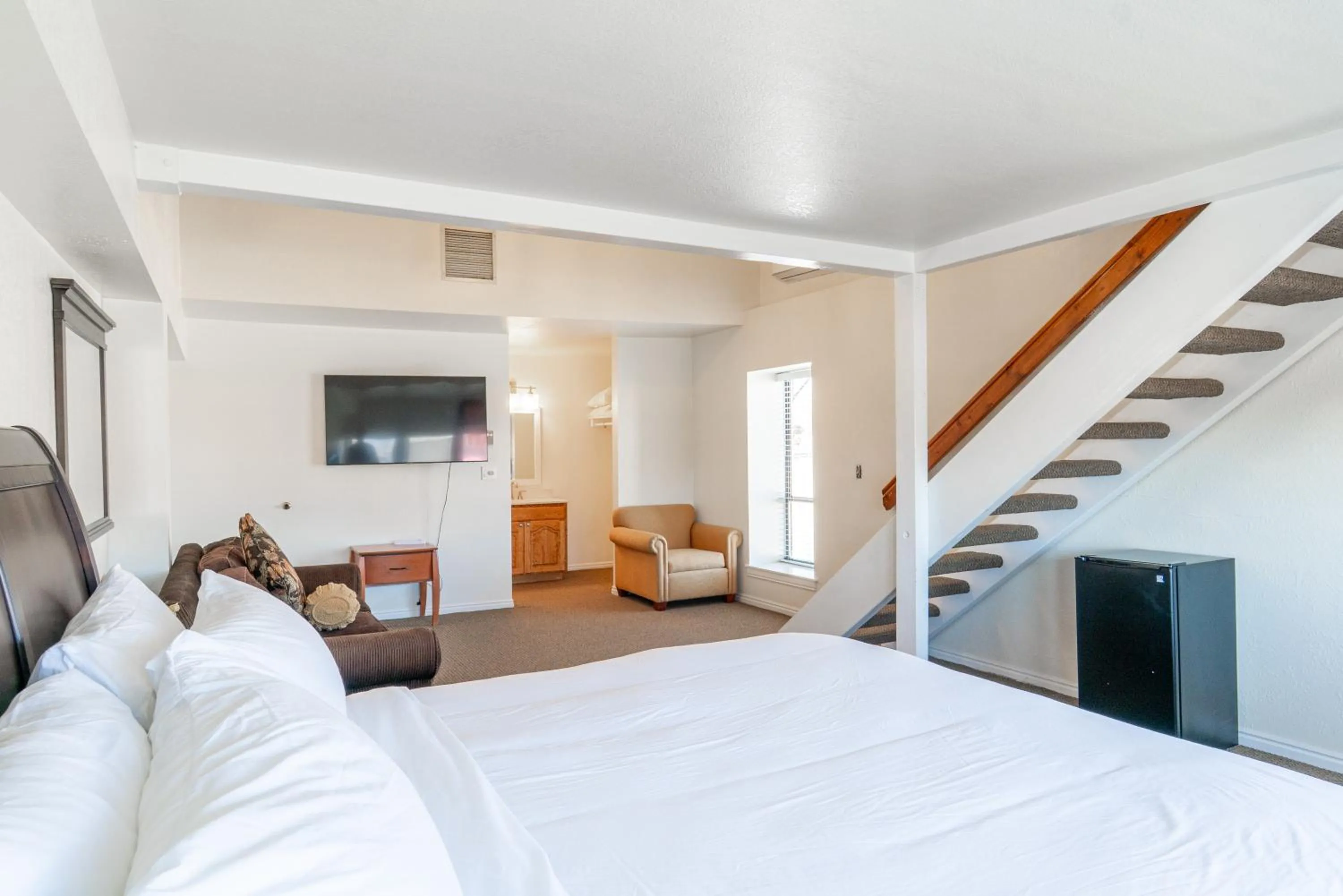 Bed in Road Creek Inn