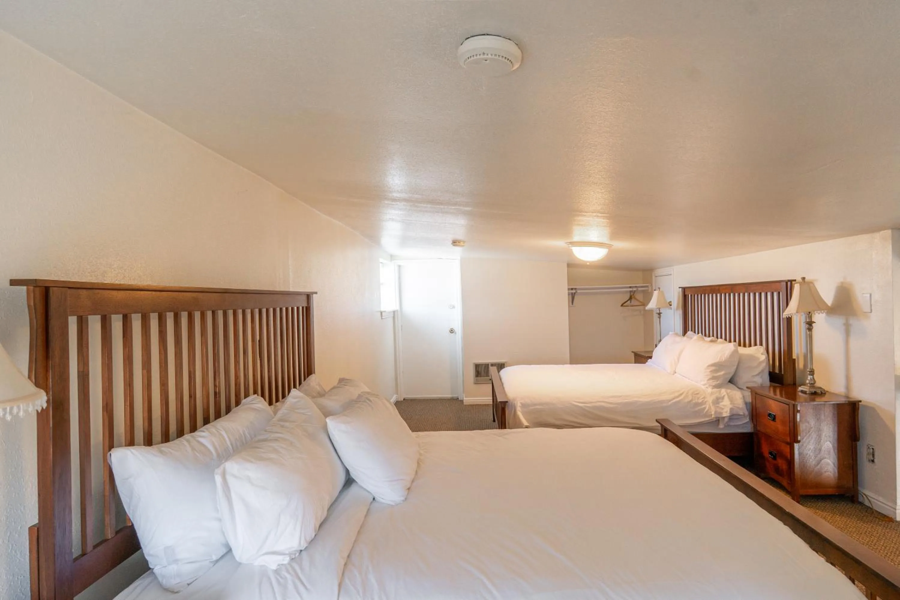 Bed in Road Creek Inn