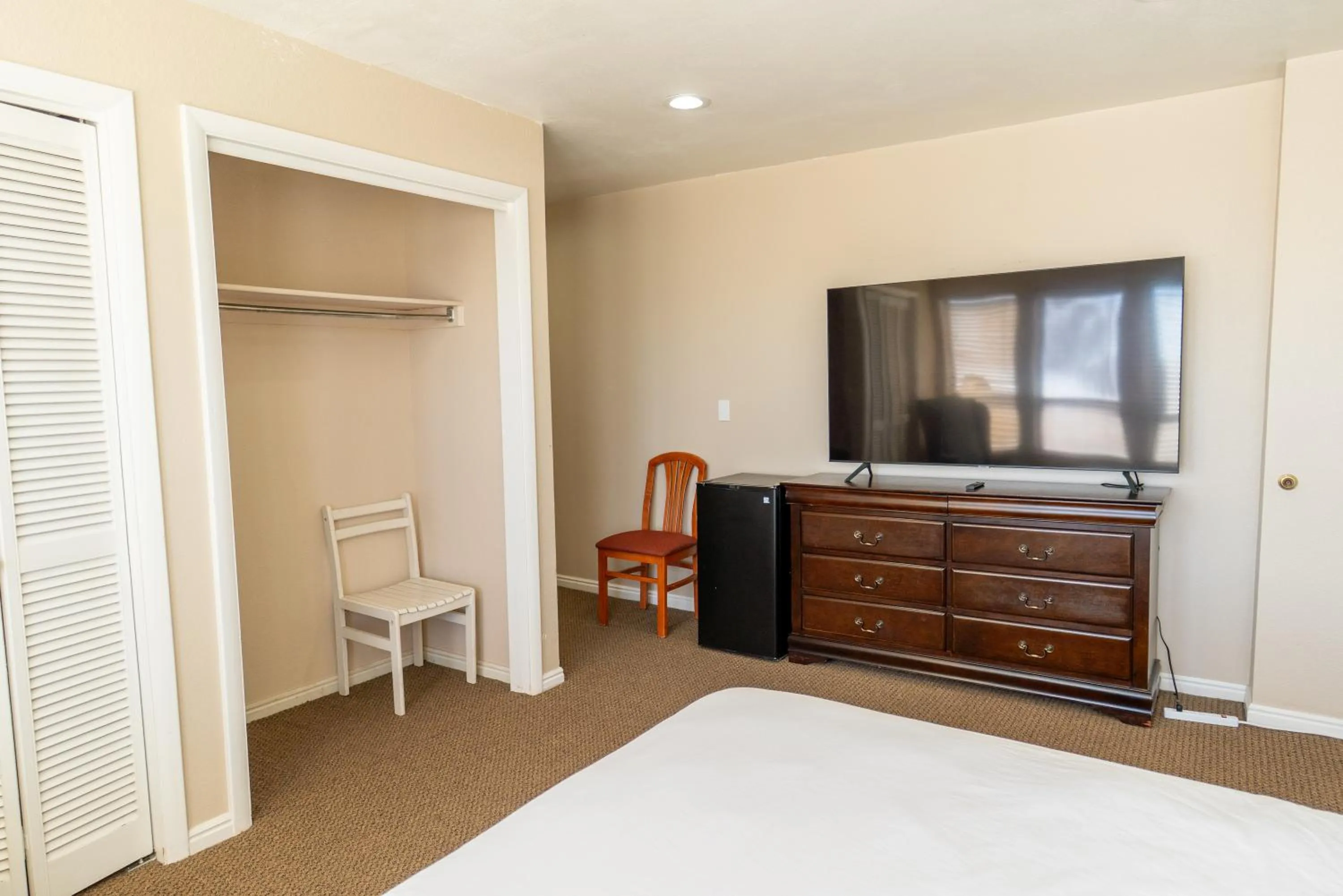 Bed in Road Creek Inn
