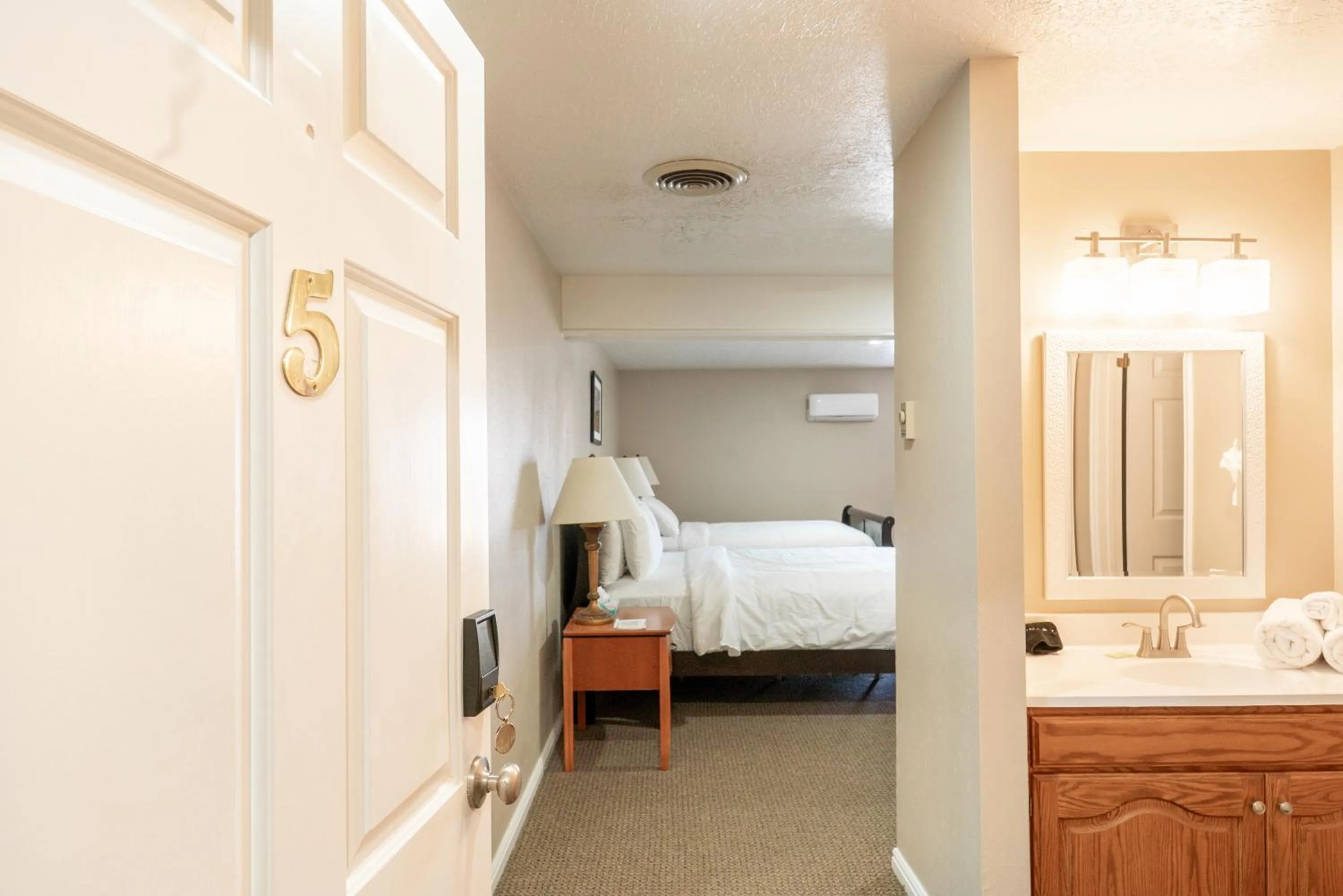 Bed in Road Creek Inn