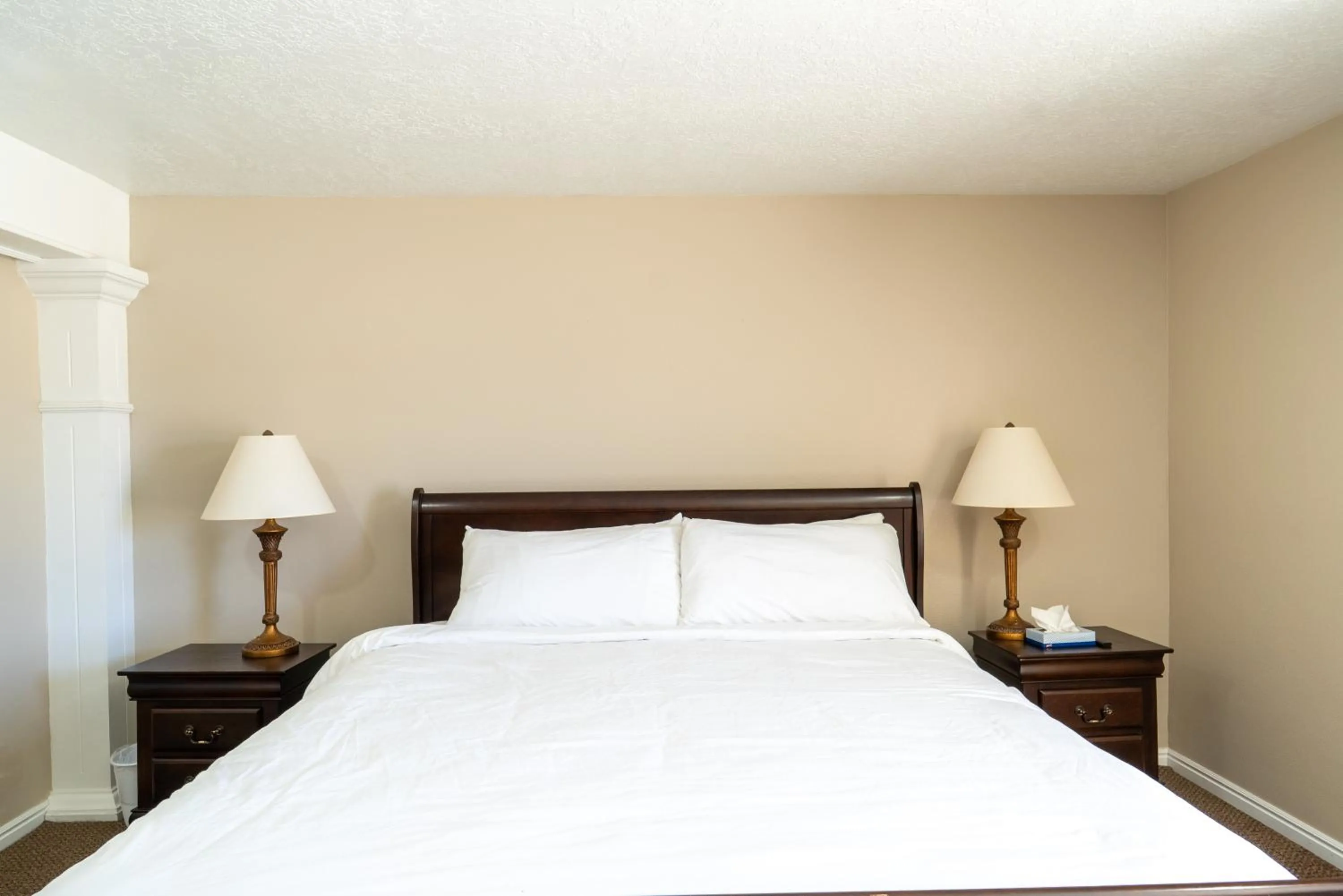 Bed in Road Creek Inn