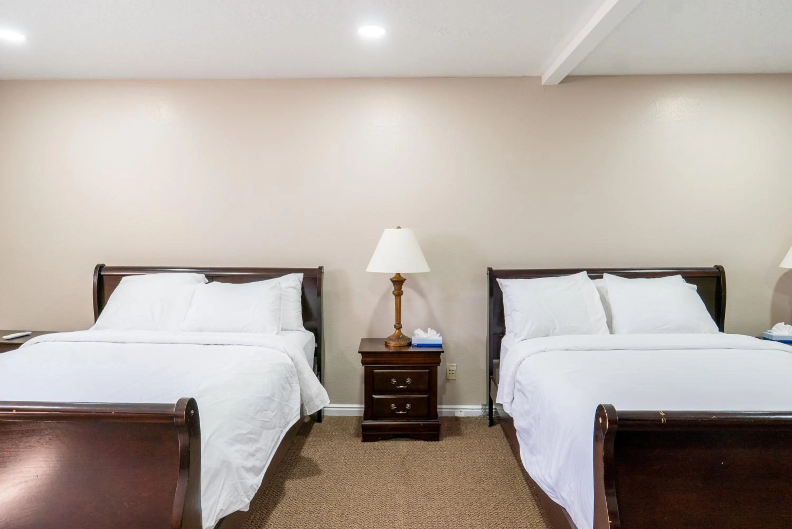 Bed in Road Creek Inn