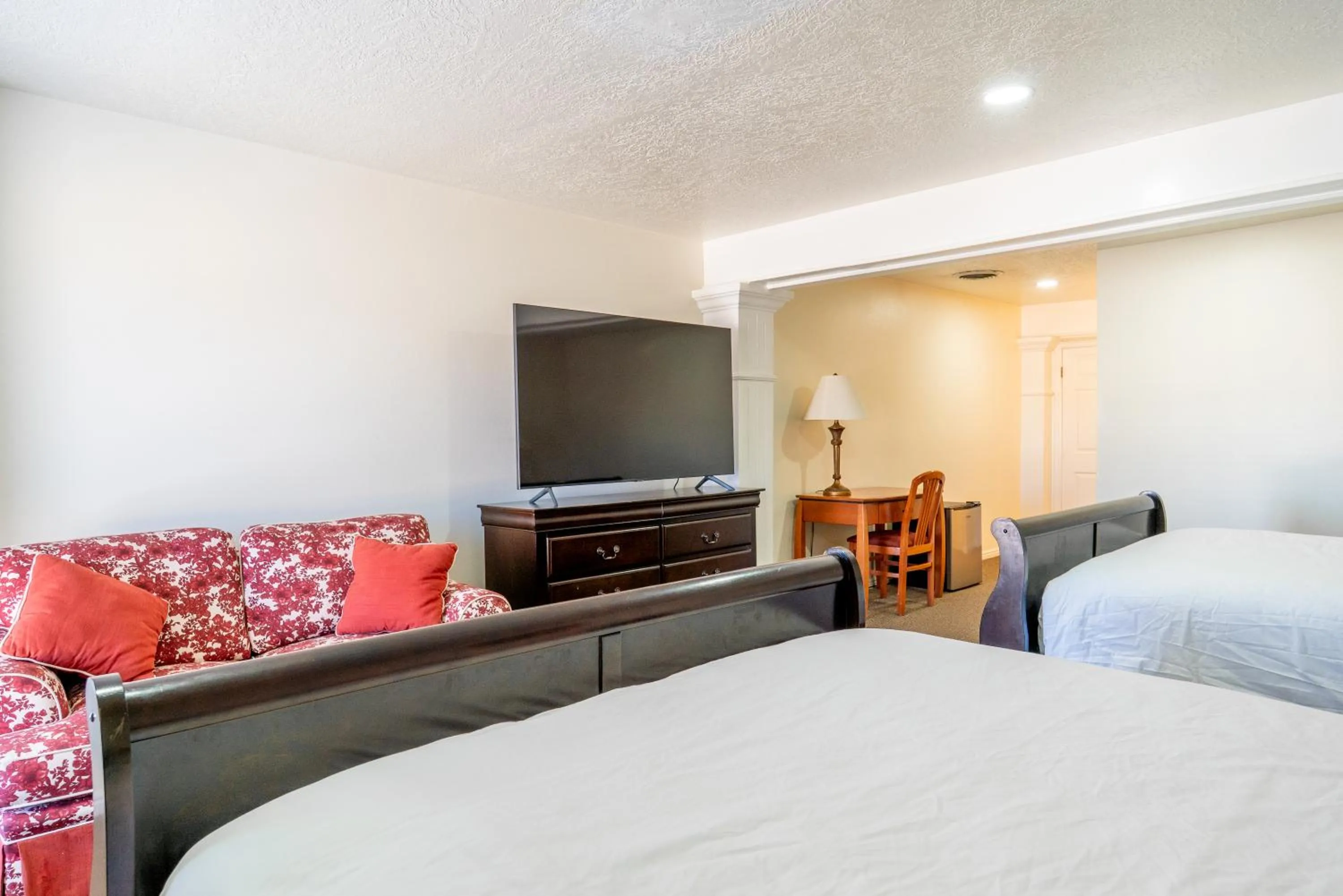 Bed in Road Creek Inn