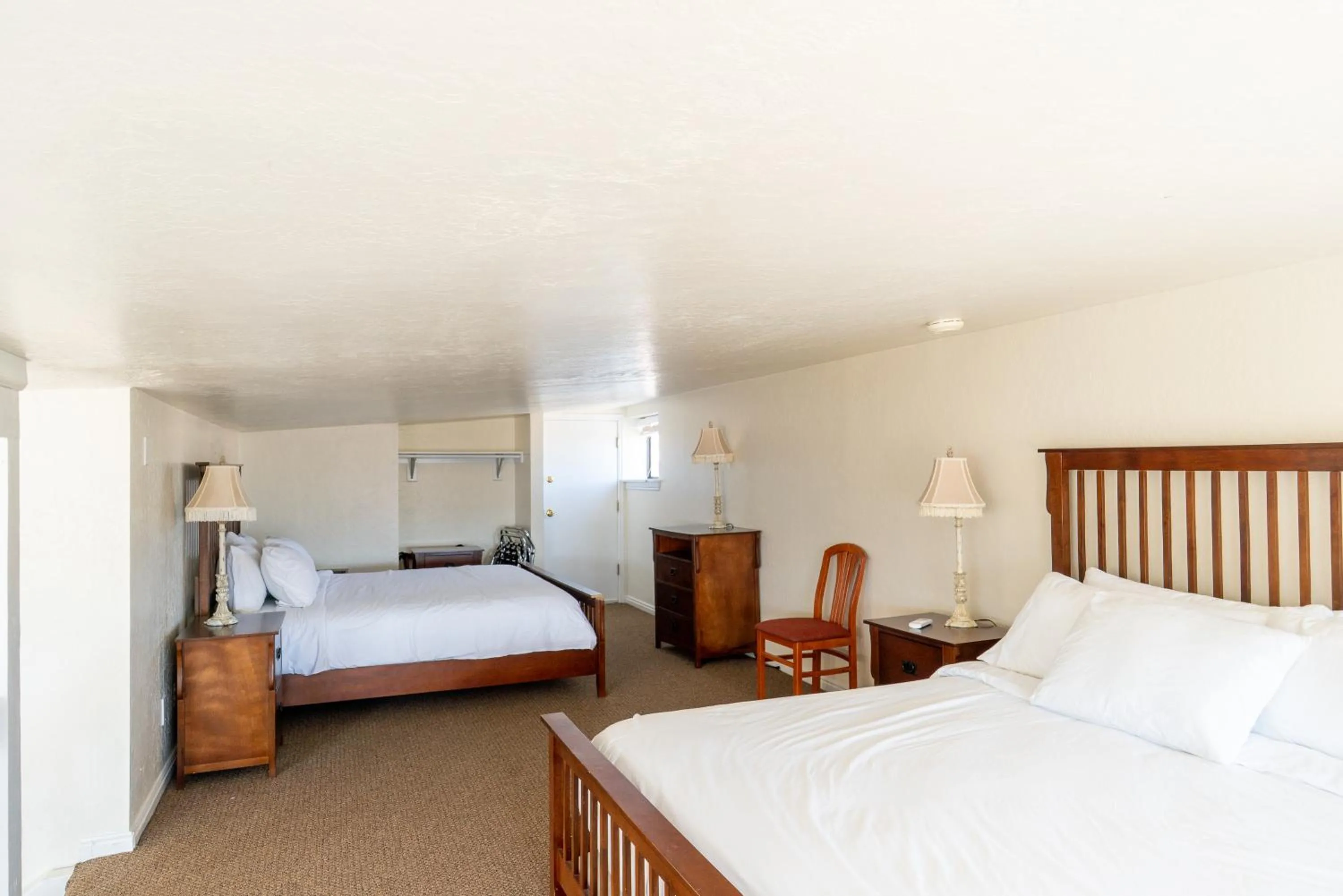 Bed in Road Creek Inn