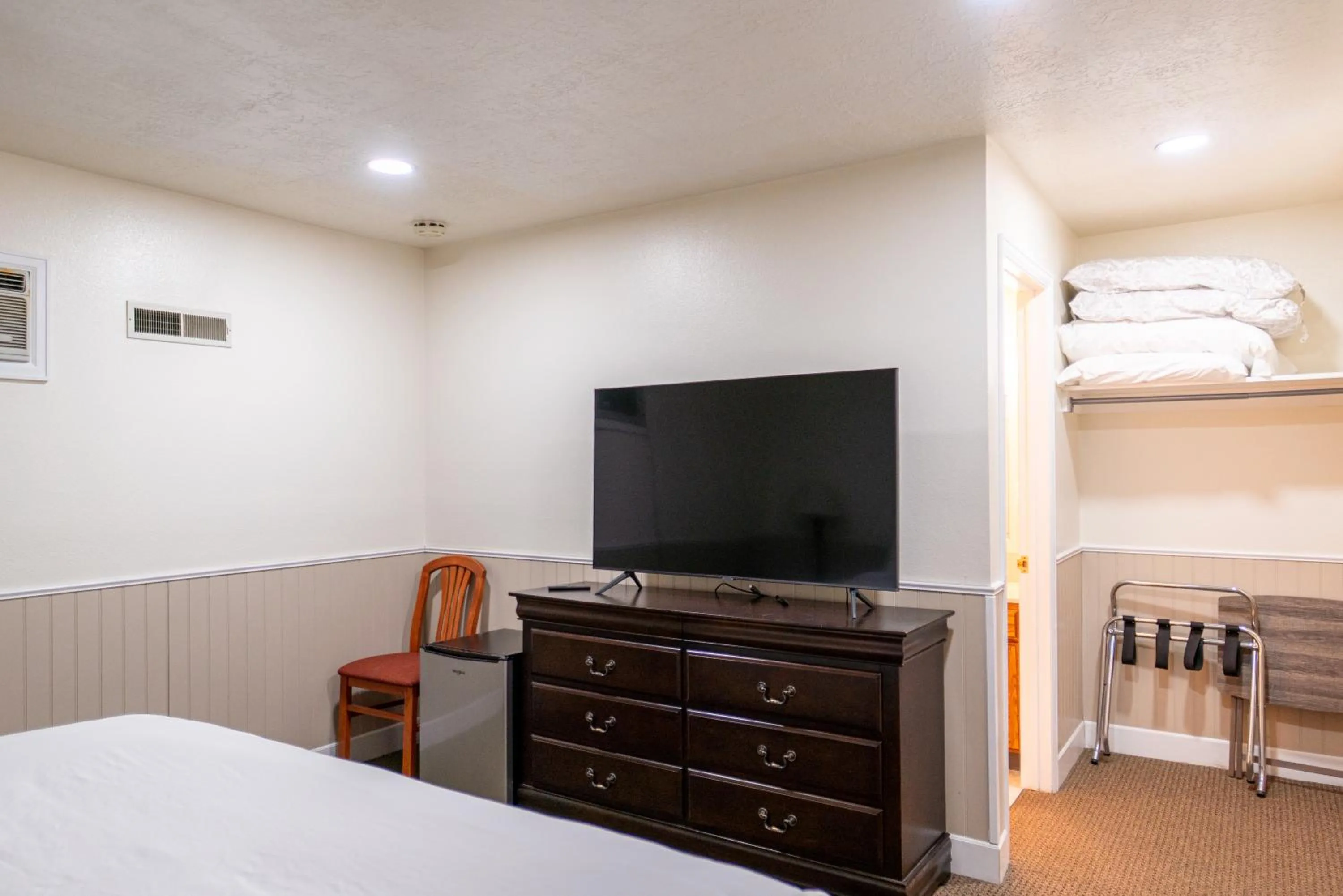 Bed in Road Creek Inn