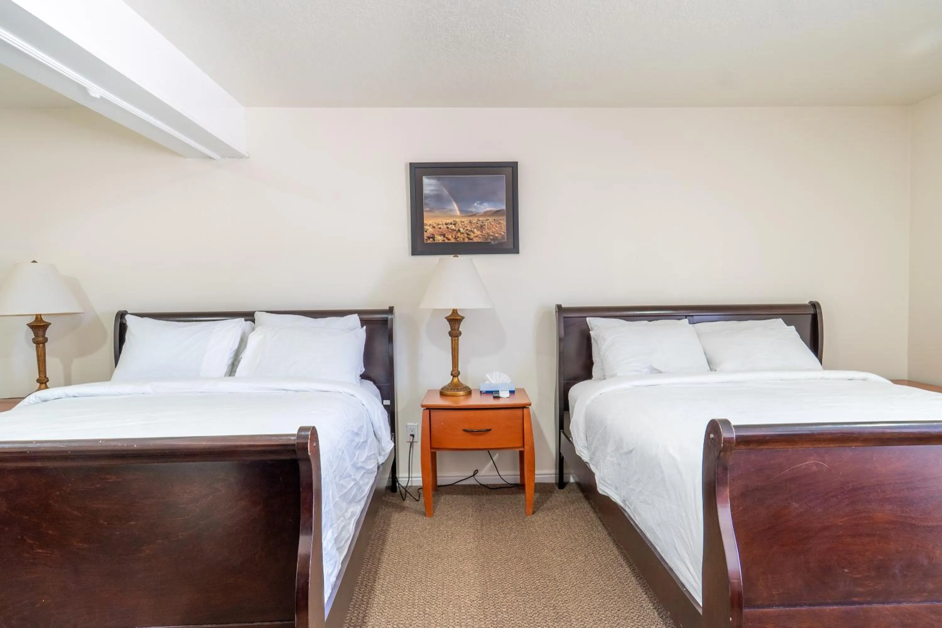 Bed in Road Creek Inn