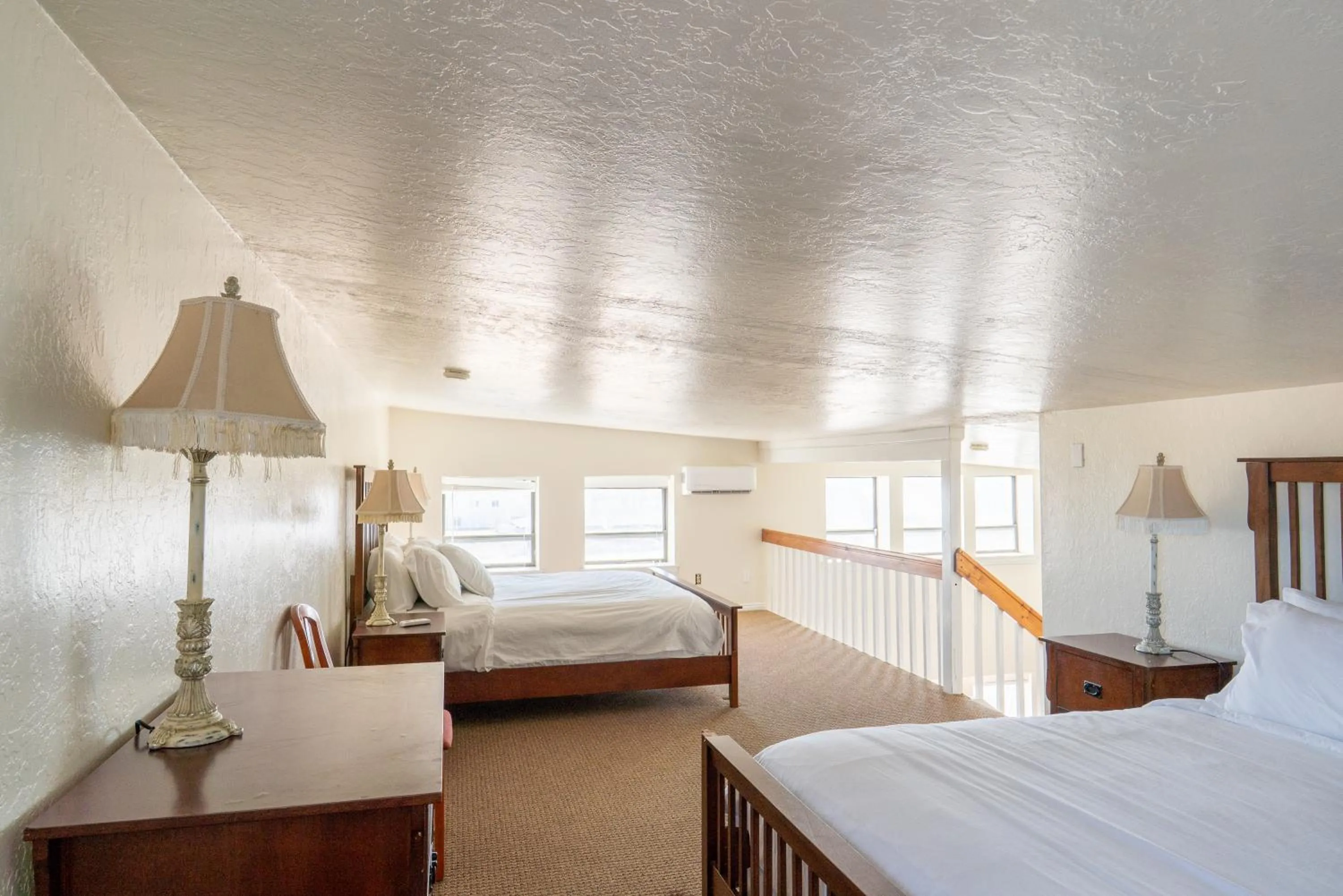 Bed in Road Creek Inn