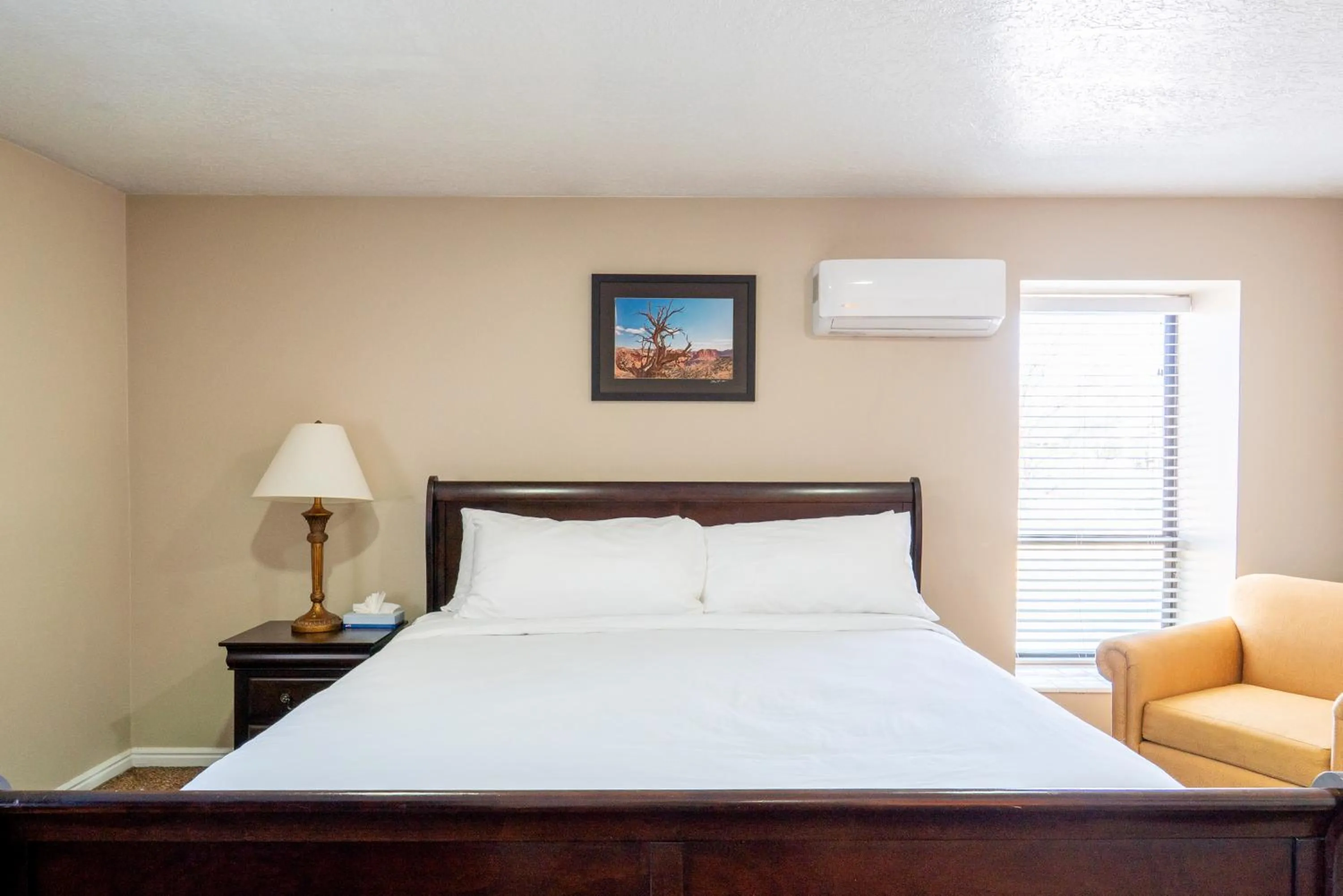 Bed in Road Creek Inn