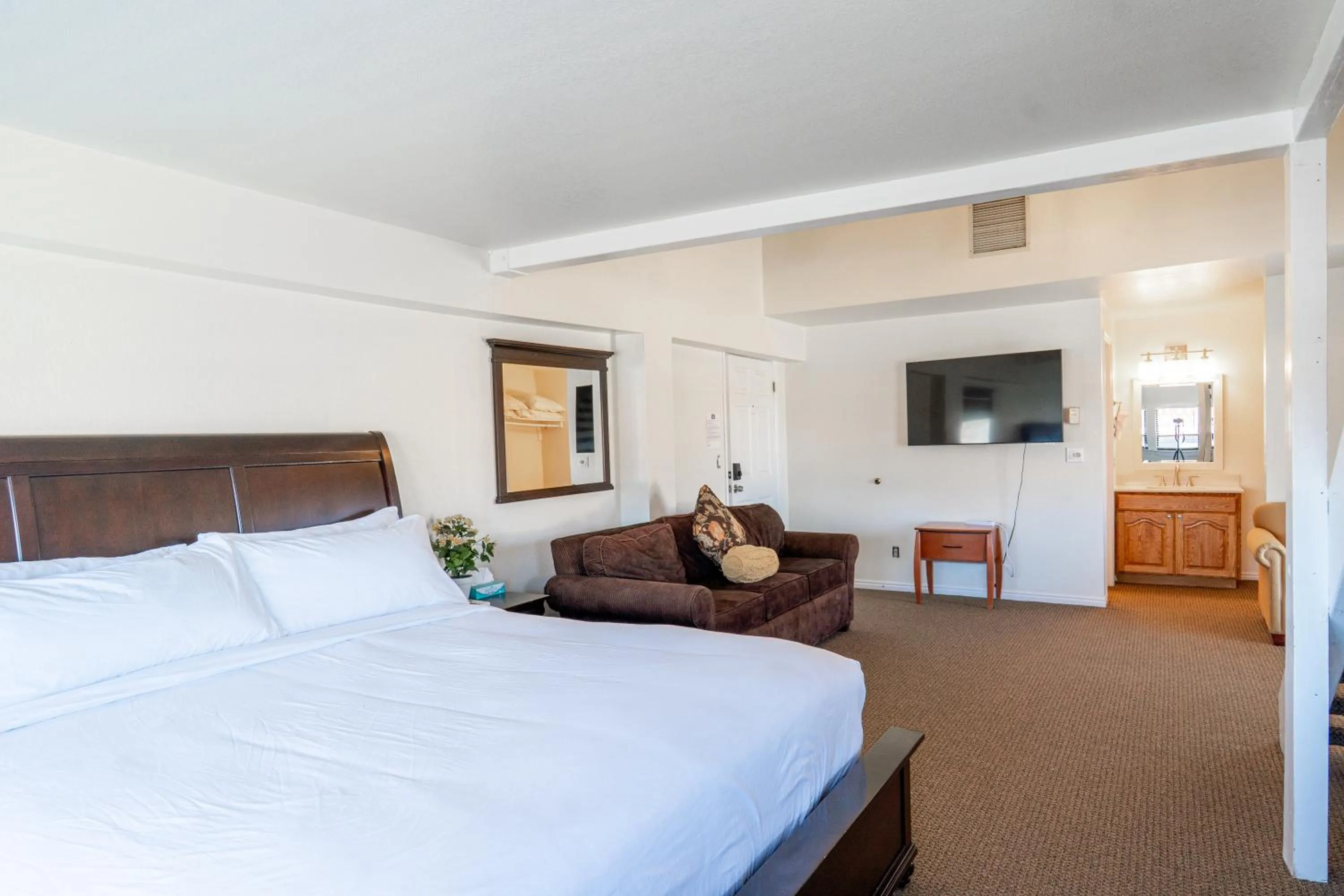 Bed in Road Creek Inn