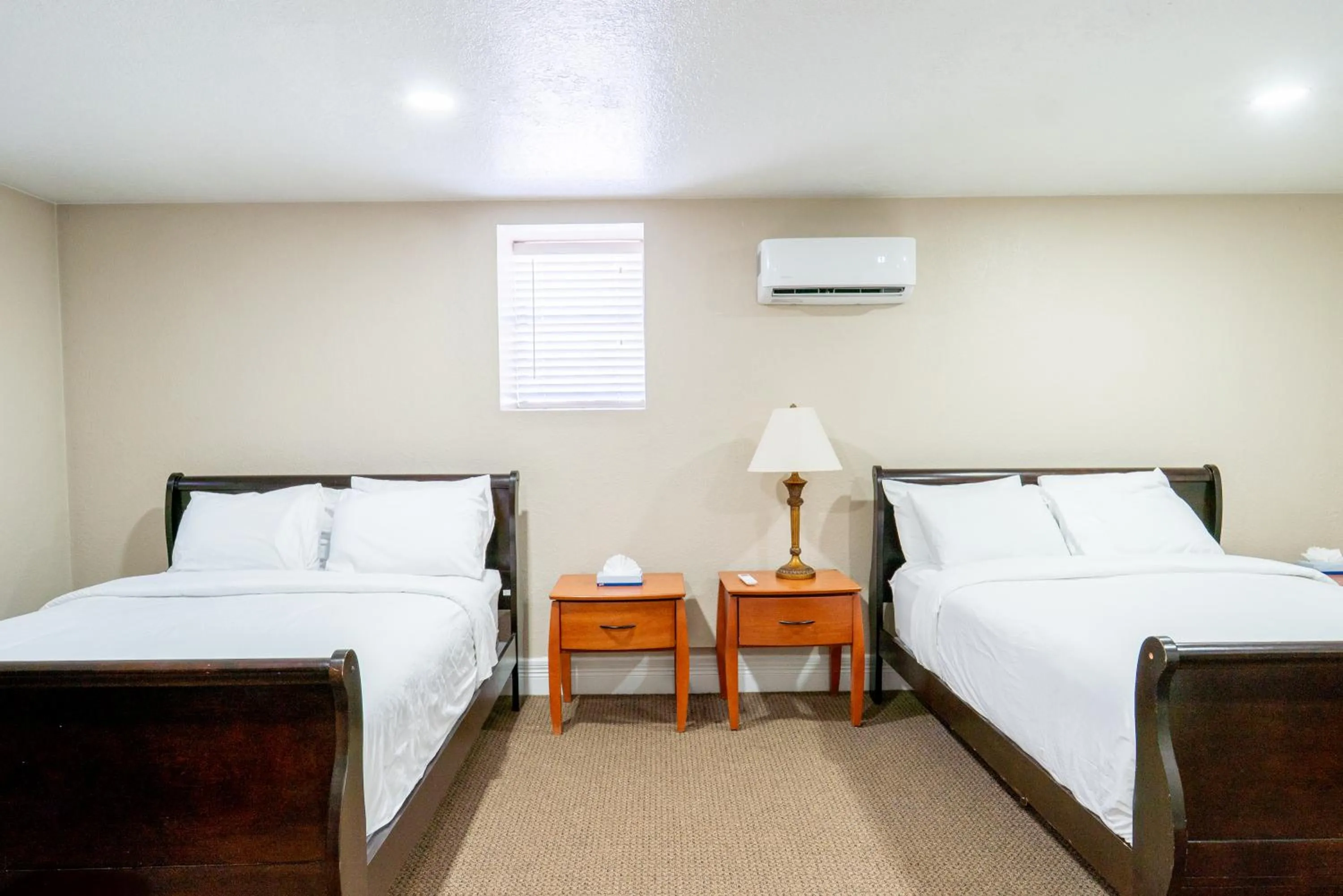 Bed in Road Creek Inn