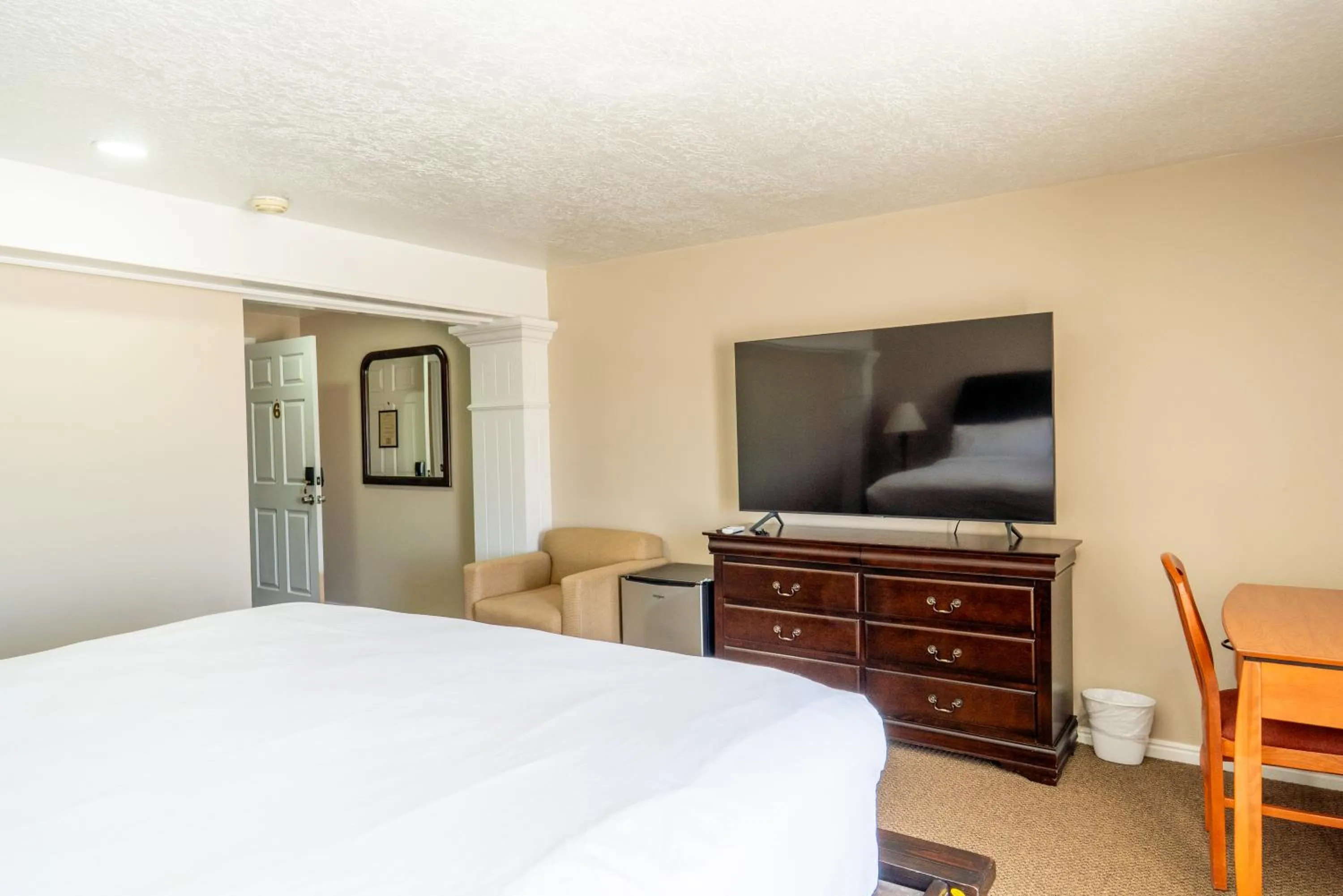 Bed in Road Creek Inn