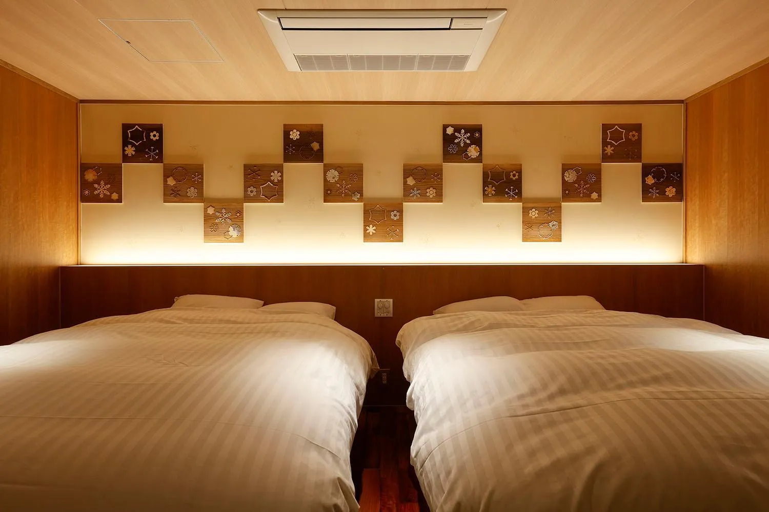 Bed in Yuraku Kinosaki Spa & Gardens