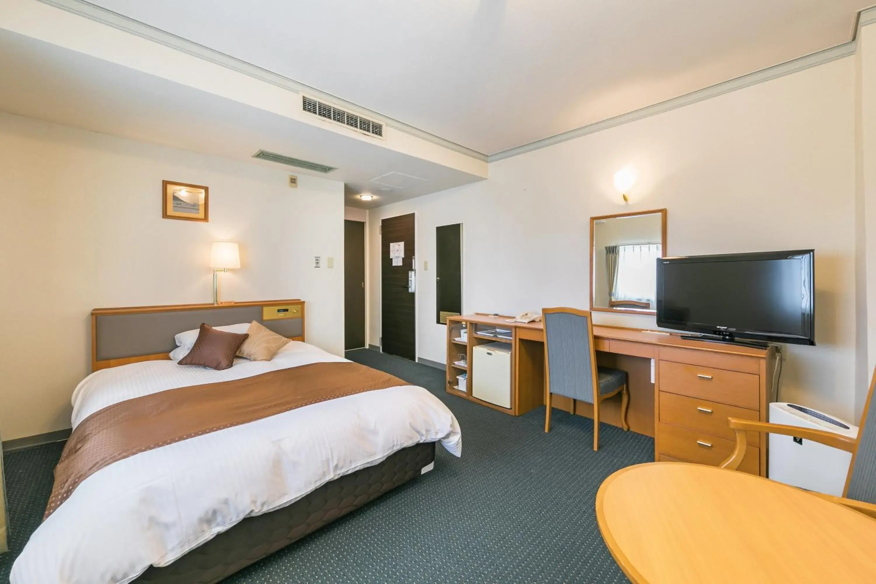 Bed in Hotel Miyahira Bed in Hotel Miyahira